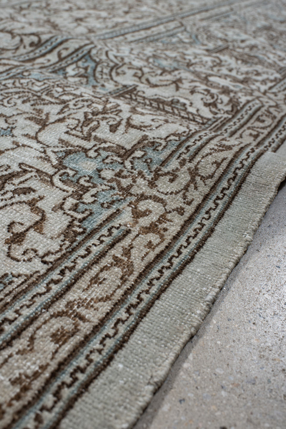 9' x 12' one-of-a-kind handmade vintage large size rug. Color palette: pale blue, ivory, taupe, brown, sky blue, light blue