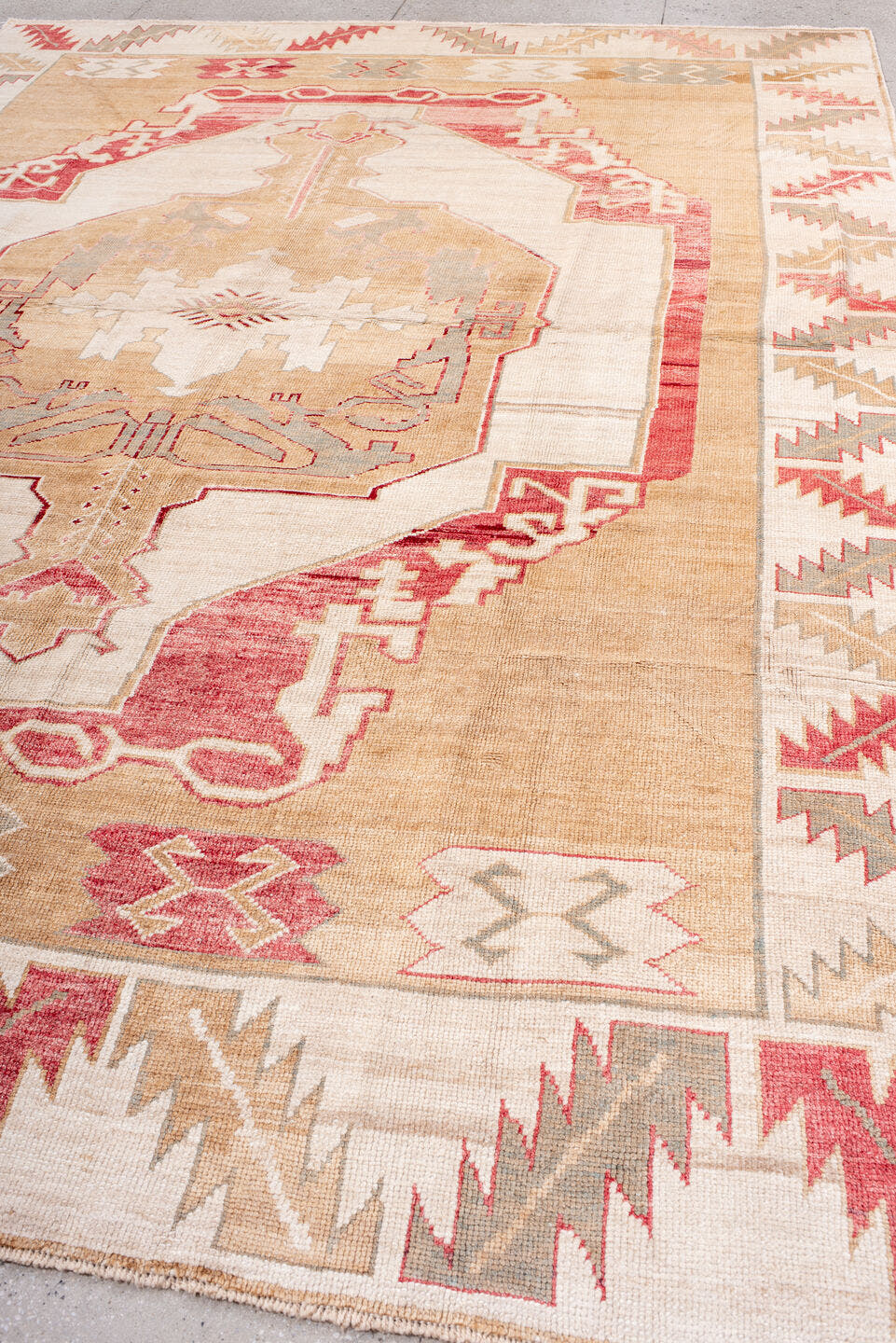 9' x 13' one-of-a-kind handmade vintage Kars large size rug. Color palette: camel, ivory, rose, taupe, sage, beige, pink