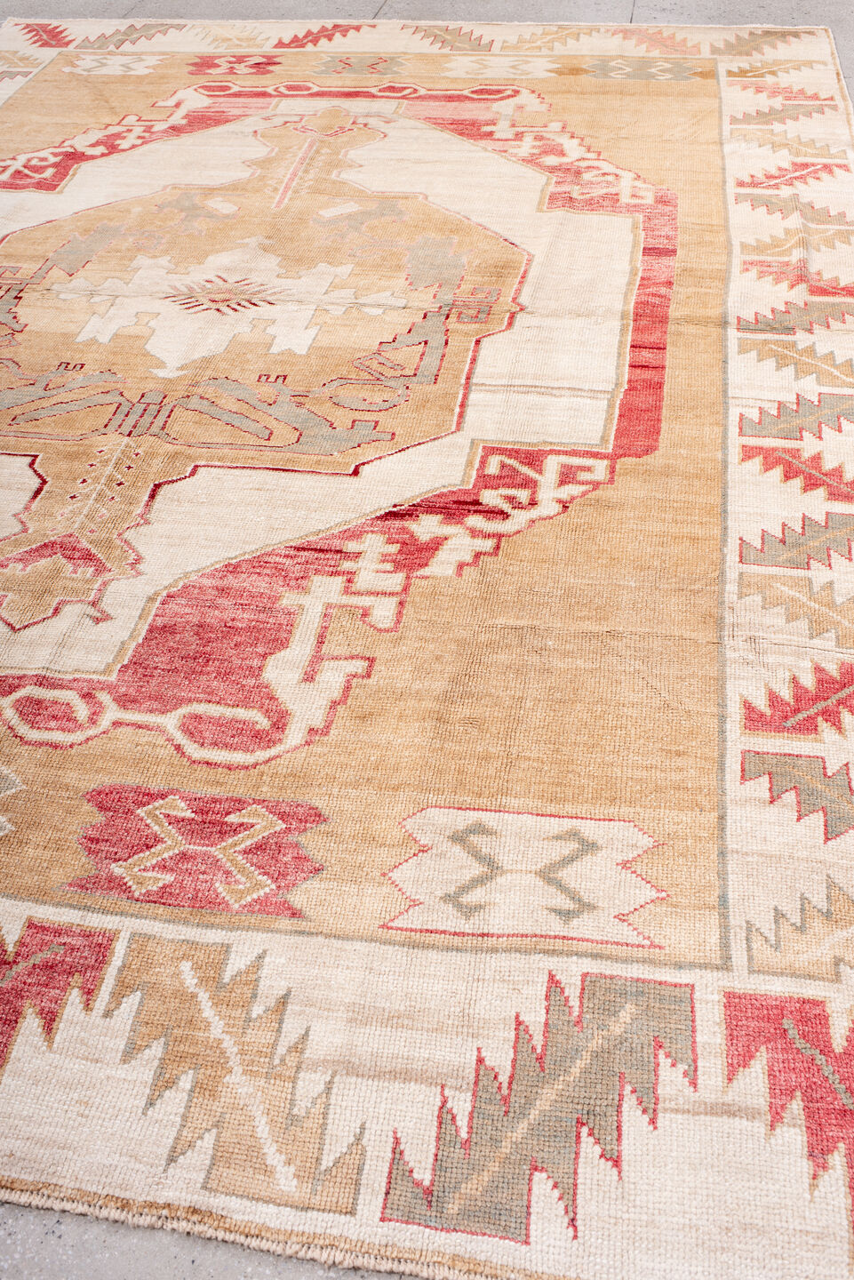 9' x 13' one-of-a-kind handmade vintage Kars large size rug. Color palette: camel, ivory, rose, taupe, sage, beige, pink