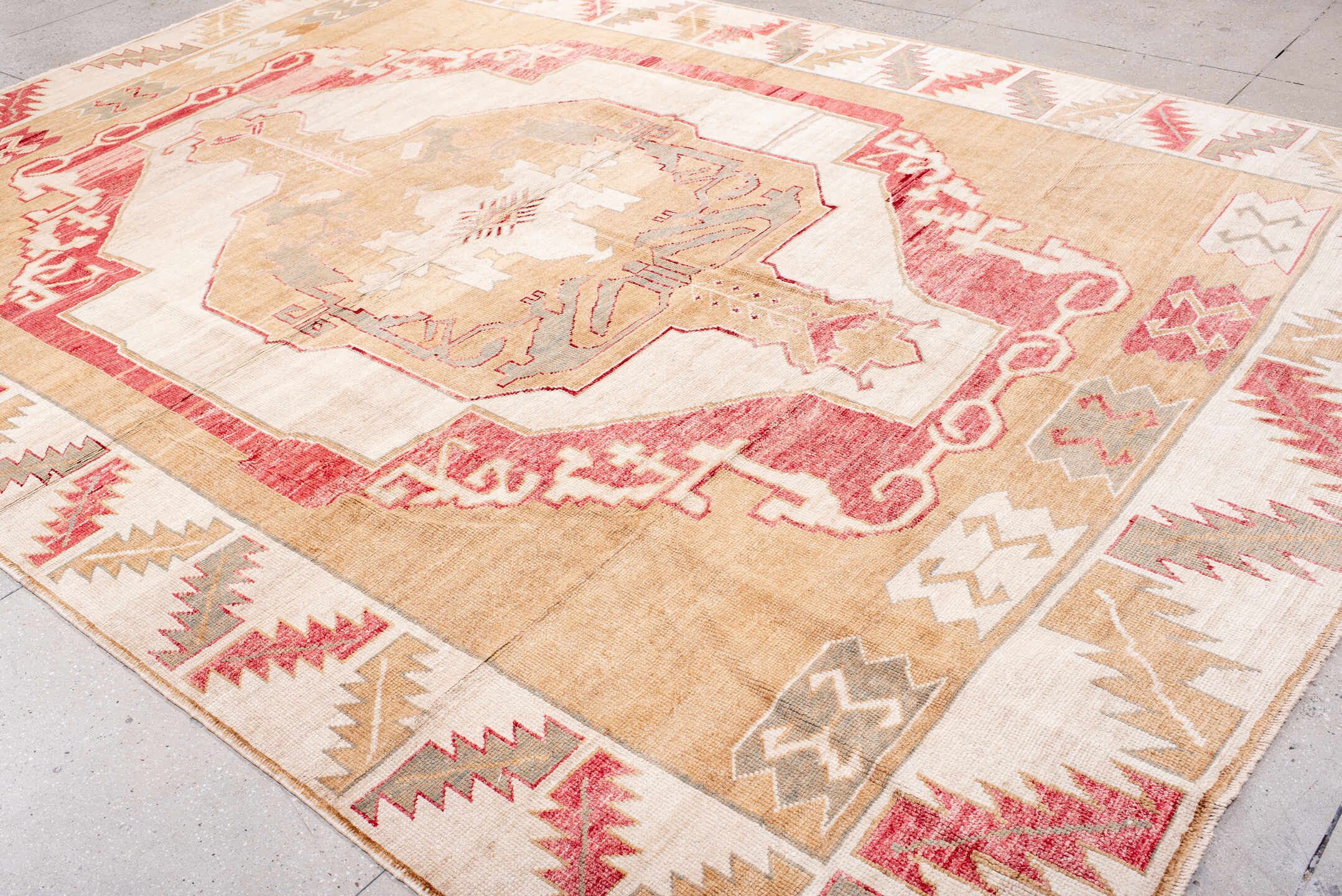 9' x 13' one-of-a-kind handmade vintage Kars large size rug. Color palette: camel, ivory, rose, taupe, sage, beige, pink
