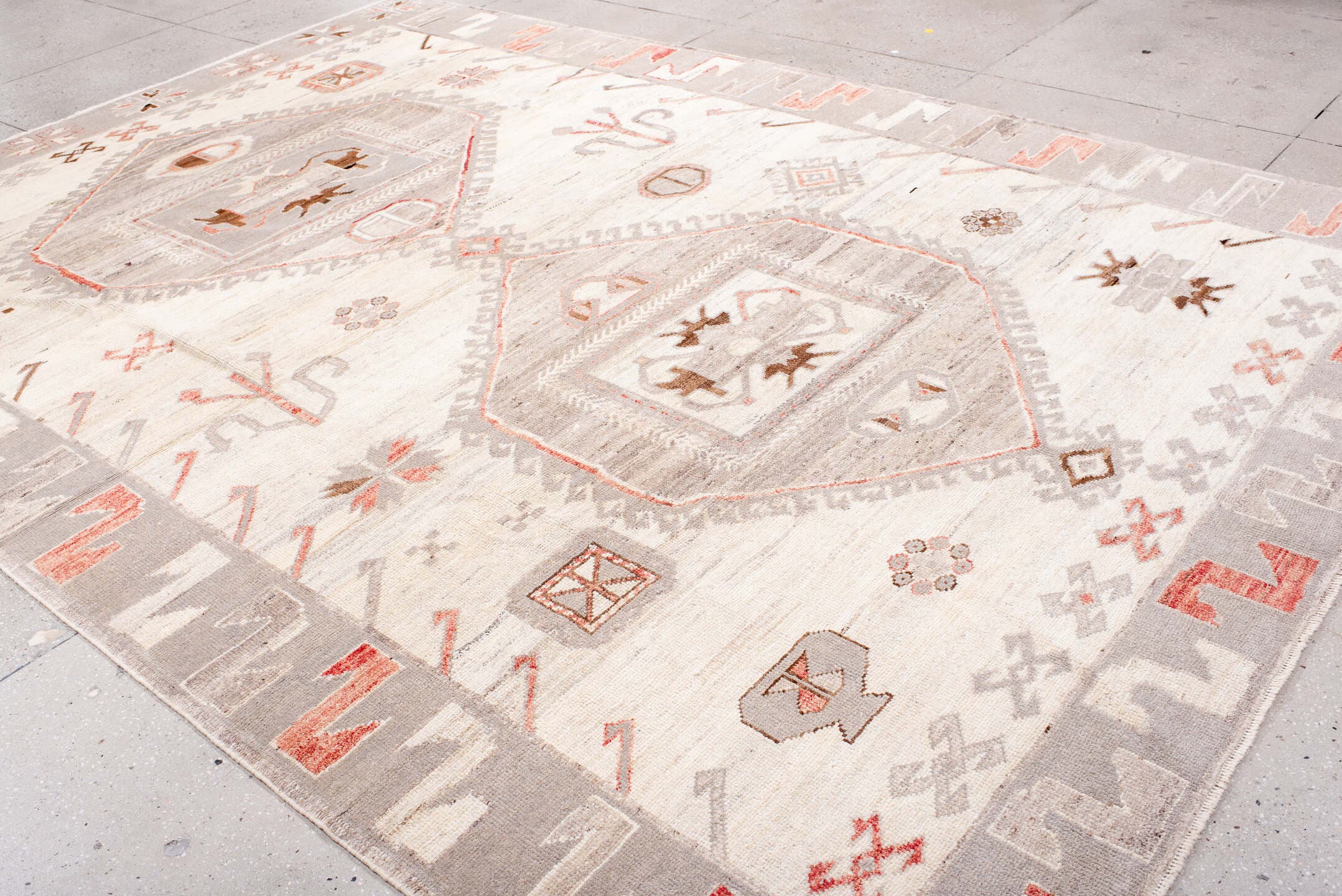 9' x 12' one-of-a-kind handmade vintage Kars large size rug. Color palette: ivory, taupe, light gray, coral, brown, beige