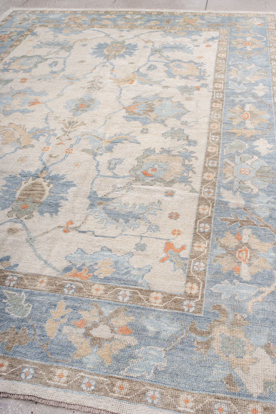 8' x 11' one-of-a-kind handmade vintage Oushak large size rug. Color palette: ivory, powder blue, taupe, soft peach, cream
