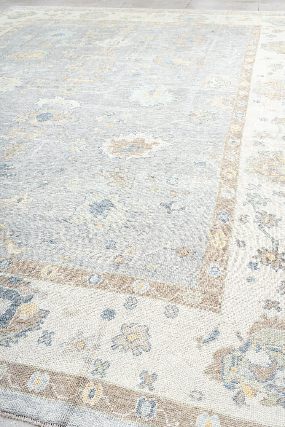 13' x 18' one-of-a-kind handmade vintage Oushak oversize rug. Color palette: pale blue, ivory, taupe, beige, gold