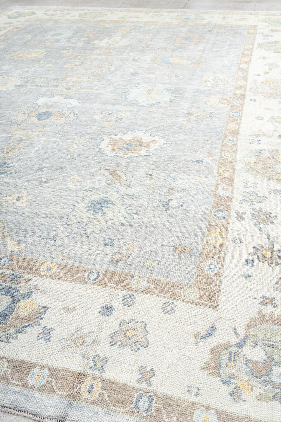 13' x 18' one-of-a-kind handmade vintage Oushak oversize rug. Color palette: pale blue, ivory, taupe, beige, gold