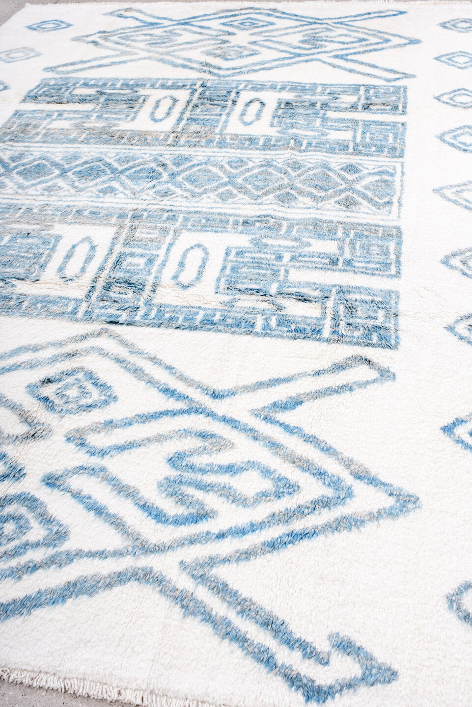 8' x 11' one-of-a-kind handmade vintage Moroccan large size rug. Color palette: blue, light blue, gray, off-white
