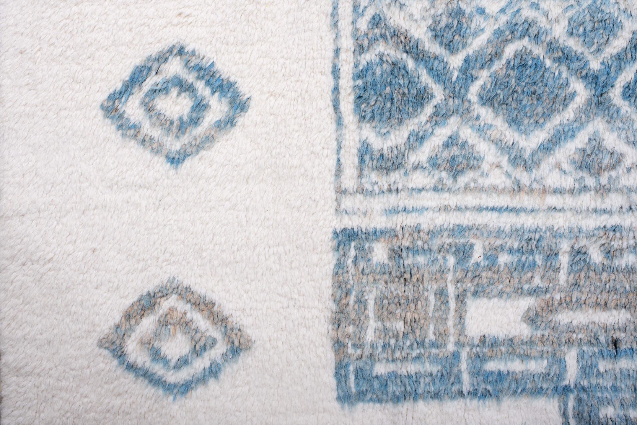 8' x 11' one-of-a-kind handmade vintage Moroccan large size rug. Color palette: ivory, sky_blue, pale_blue, light blue