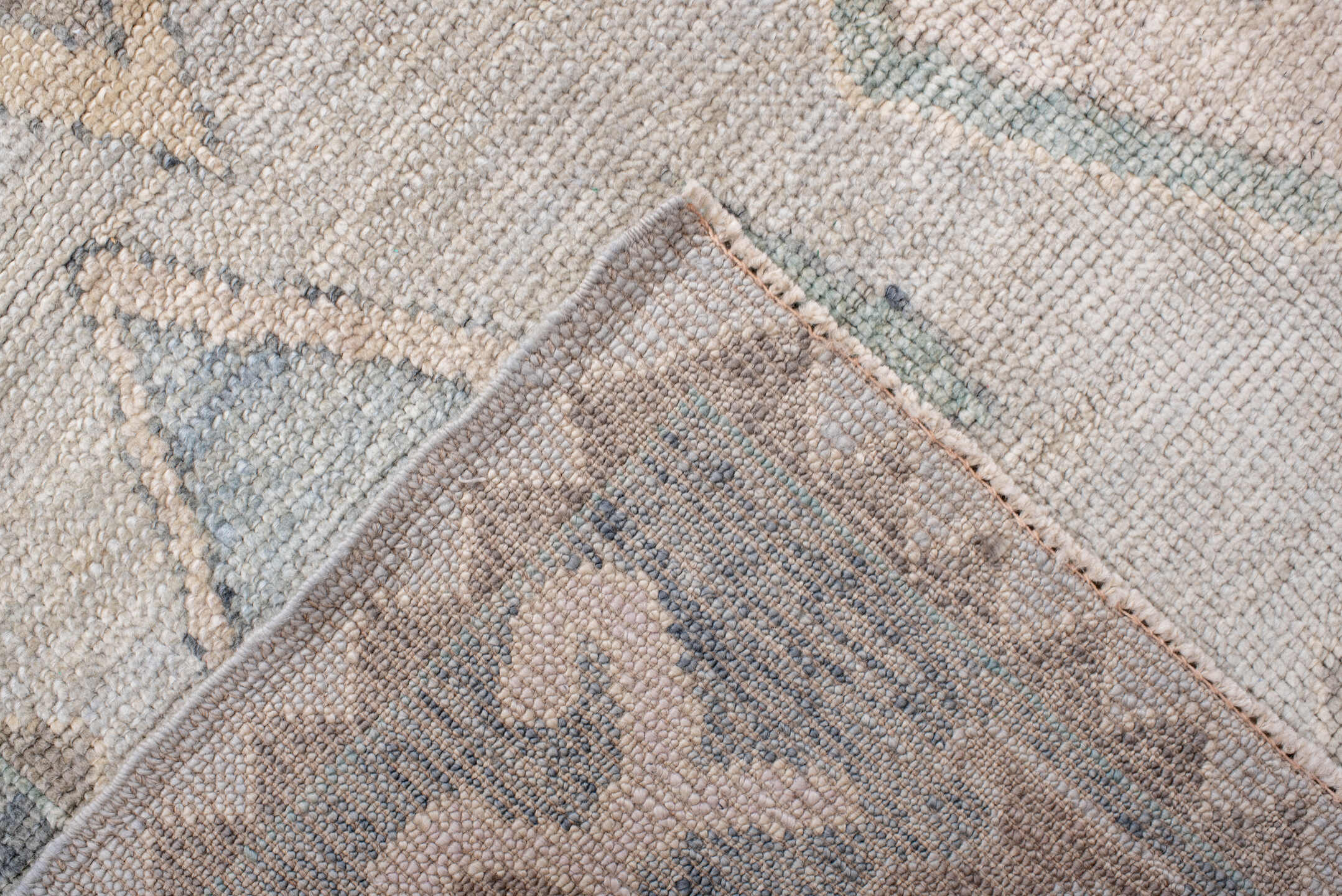 7' x 10' one-of-a-kind handmade vintage Oushak large size rug. Color palette: ivory, pale blue, taupe, cream, sage, camel