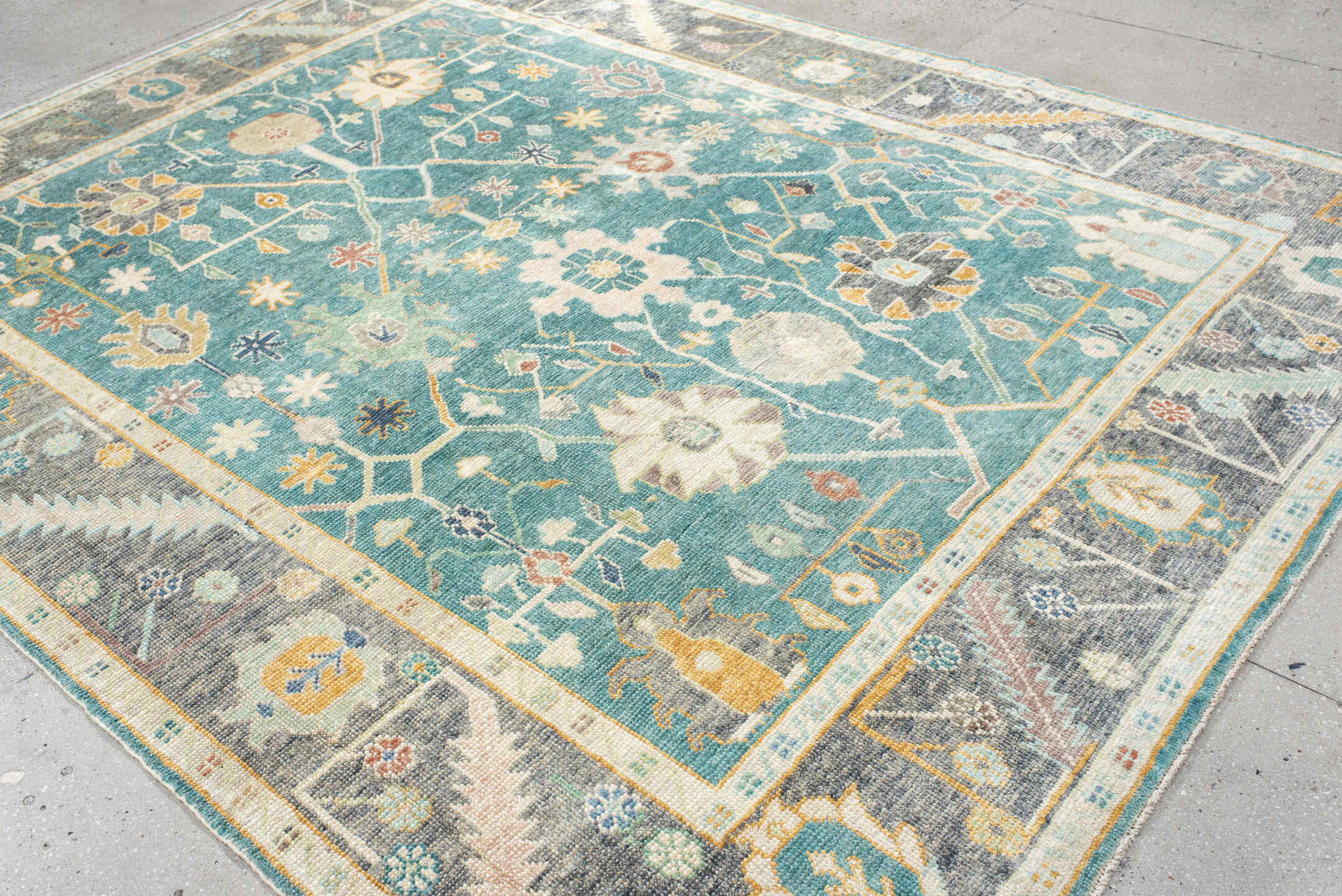 8' x 10' one-of-a-kind handmade vintage Oushak large size rug. Color palette: aqua, gray, ivory, gold, sage, blush, taupe