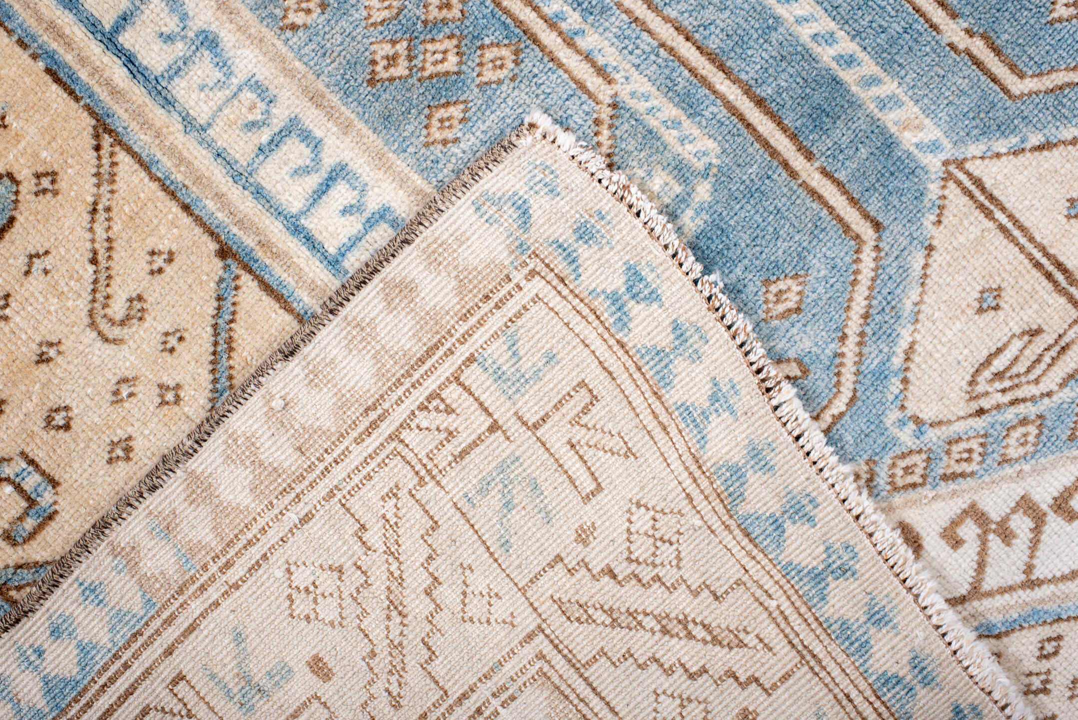4' x 6' one-of-a-kind handmade vintage Anatolian rug. Color palette: ivory, sky blue, camel, taupe, beige, brown, light blue