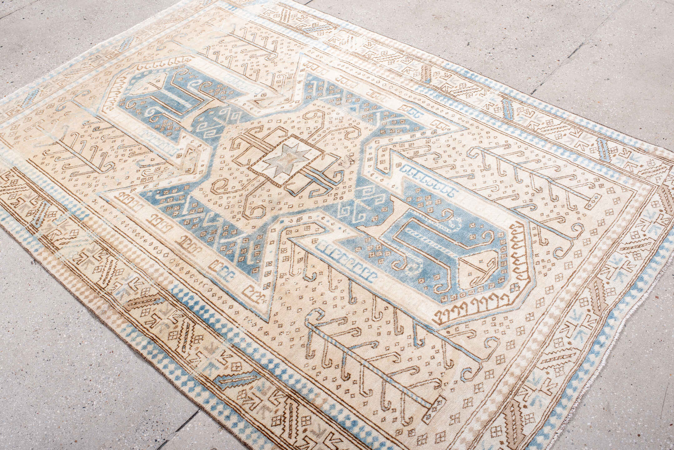 4' x 6' one-of-a-kind handmade vintage Anatolian rug. Color palette: ivory, sky blue, camel, taupe, beige, brown, light blue