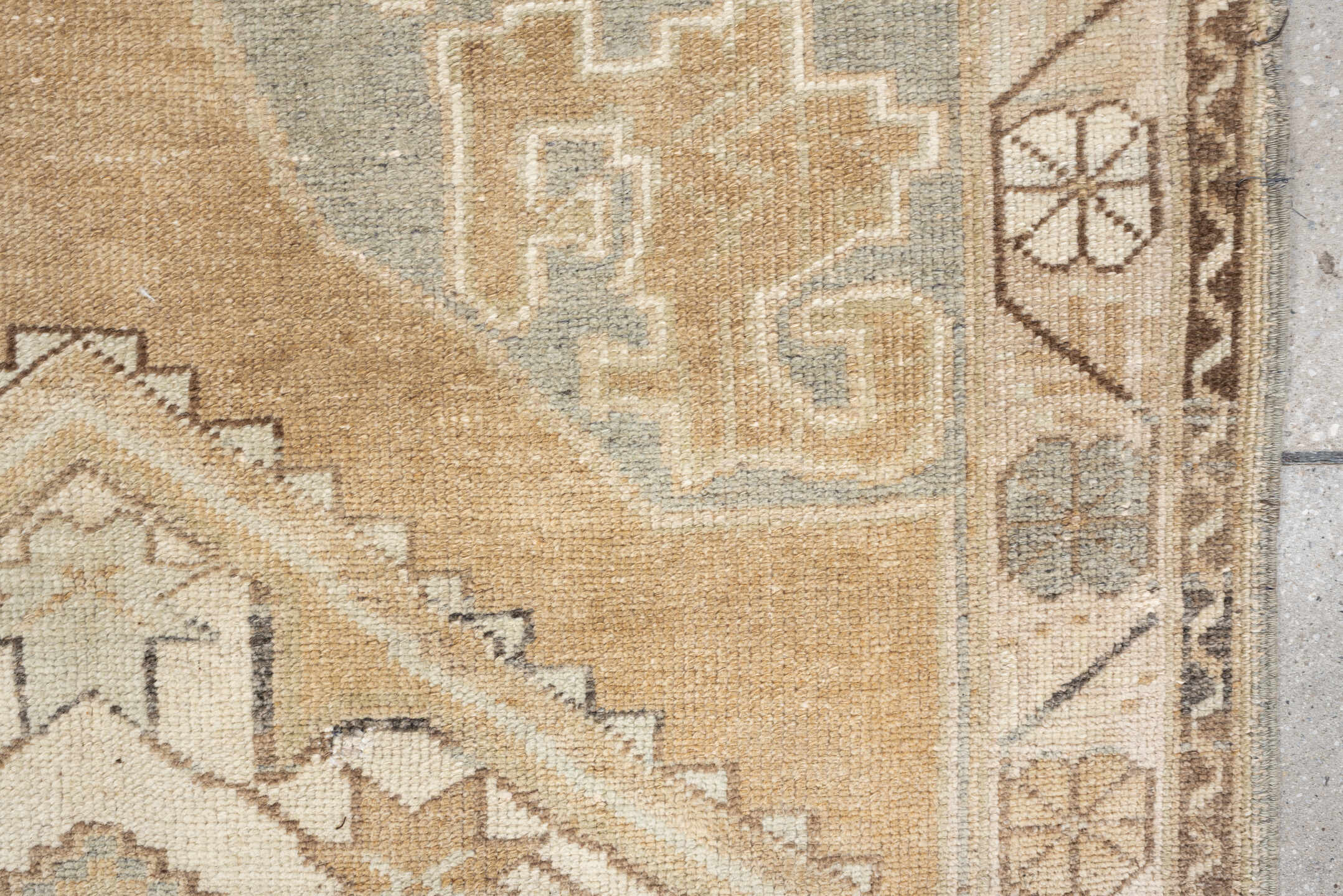 3' x 6' one-of-a-kind handmade vintage Kurd runner rug. Color palette: camel, ivory, pale blue, taupe, sand, light brown