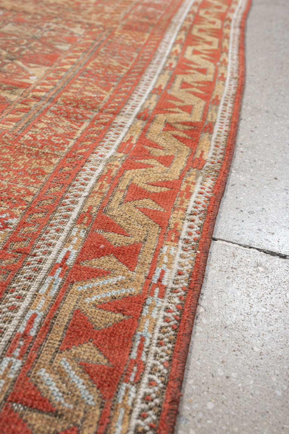 3' x 7' one-of-a-kind handmade antique Belouch rug. Color palette: terracotta, ivory, camel, taupe, rust, pale blue, brown