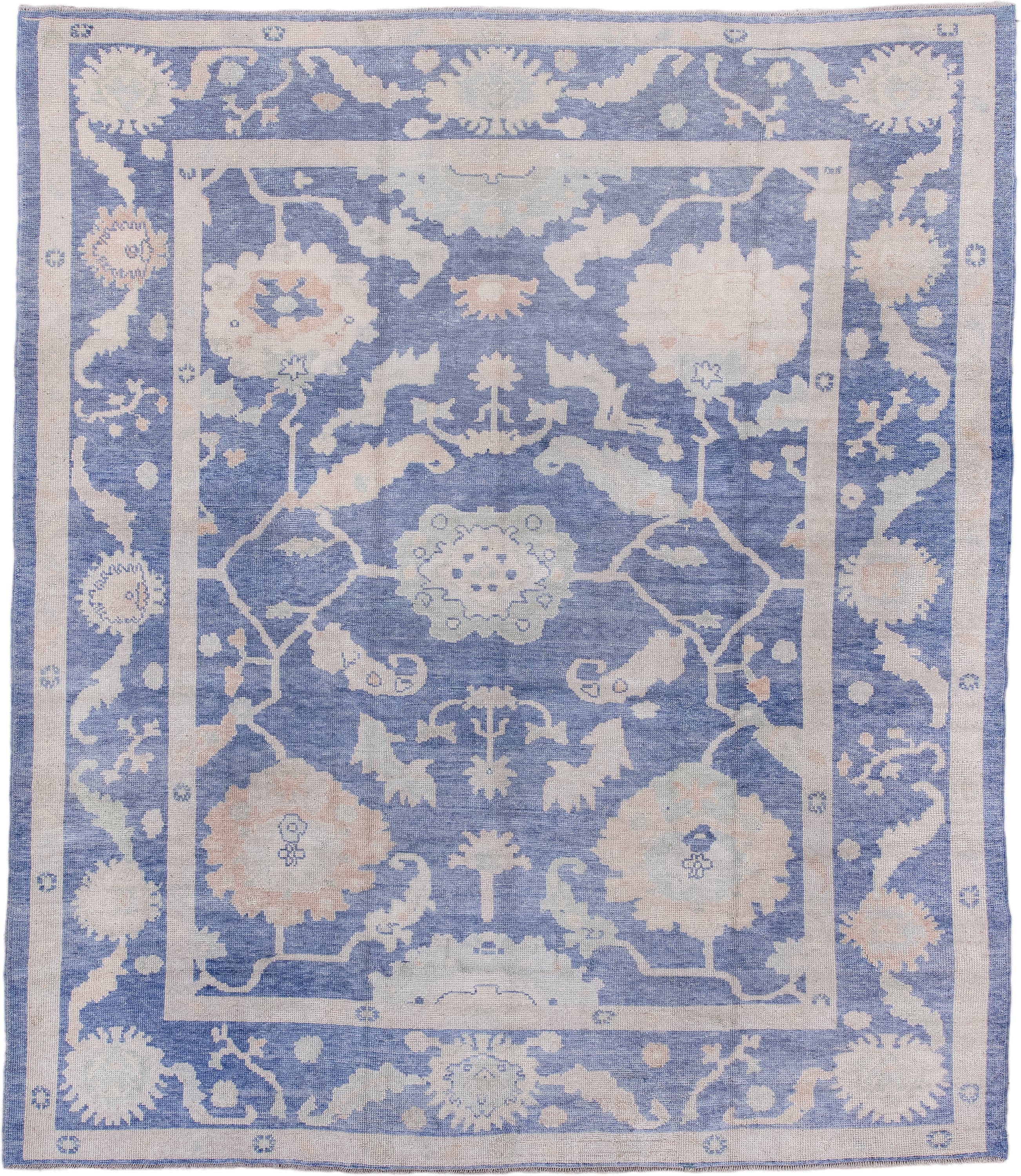 8' x 9' one-of-a-kind handmade vintage Oushak large size rug. Color palette: powder blue, ivory, blush, pale blue