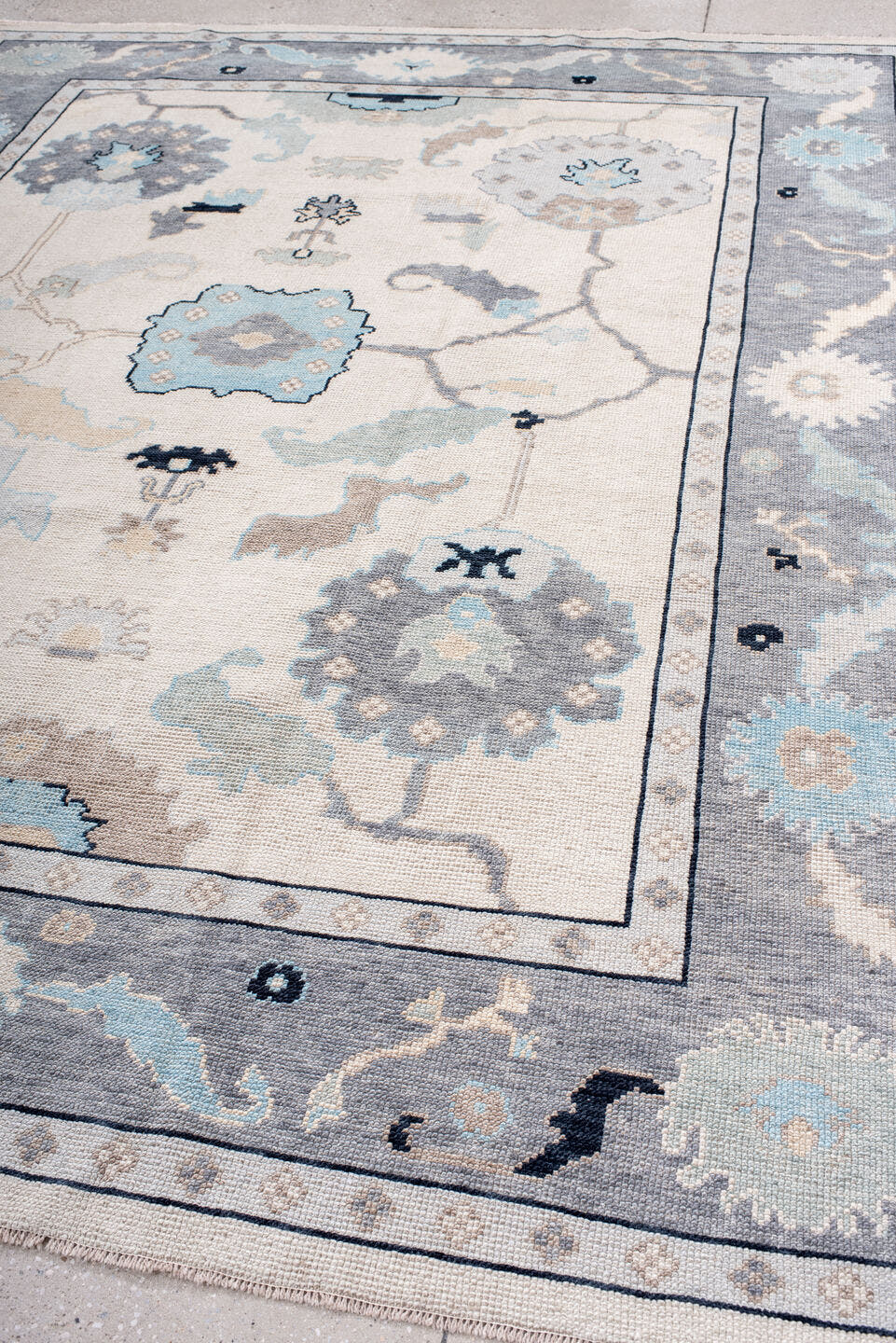 8' x 10' one-of-a-kind handmade vintage Oushak large size rug. Color palette: ivory, gray, pale blue, taupe, charcoal, cream