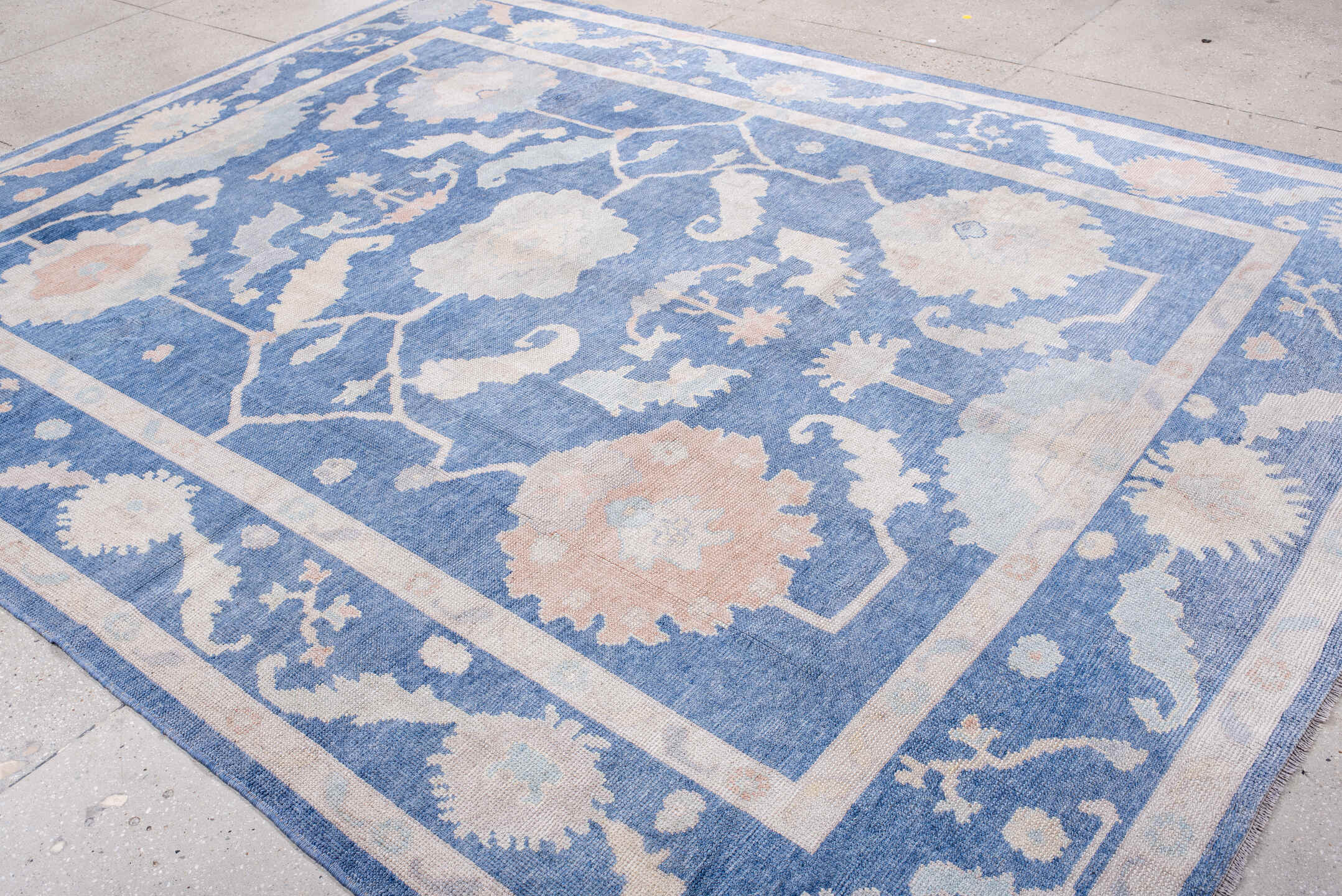 8' x 11' one-of-a-kind handmade vintage Oushak large size rug. Color palette: powder blue, ivory, blush, pale peach