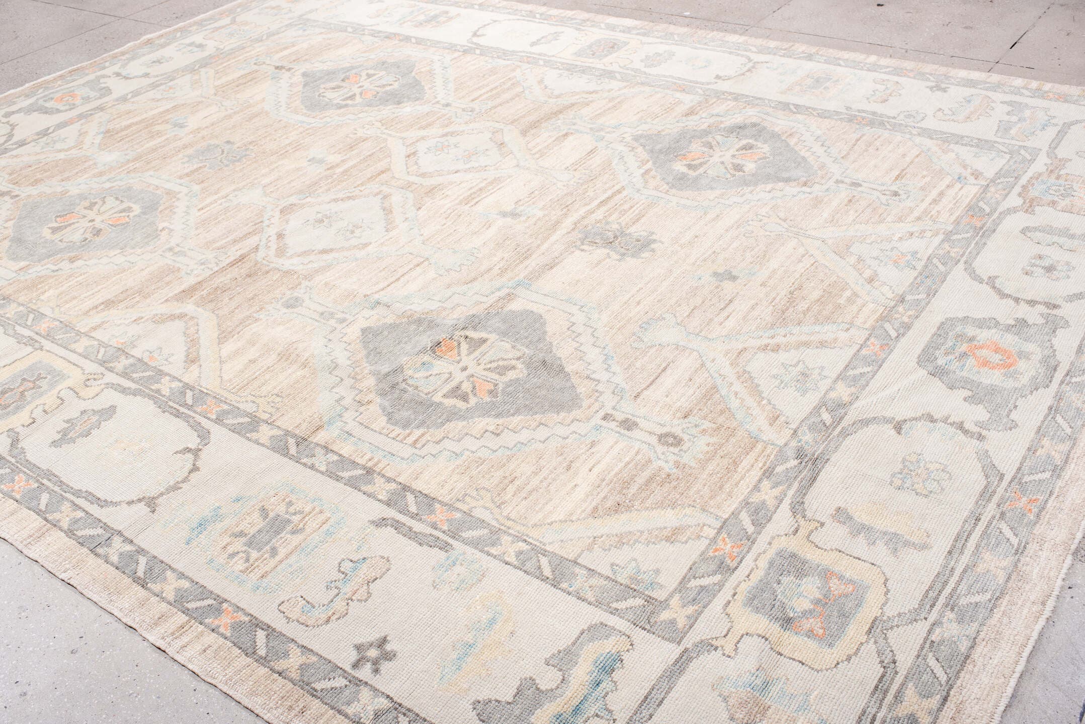 10' x 13' one-of-a-kind handmade vintage Oushak large size rug. Color palette: taupe, ivory, slate, sky blue, coral, beige