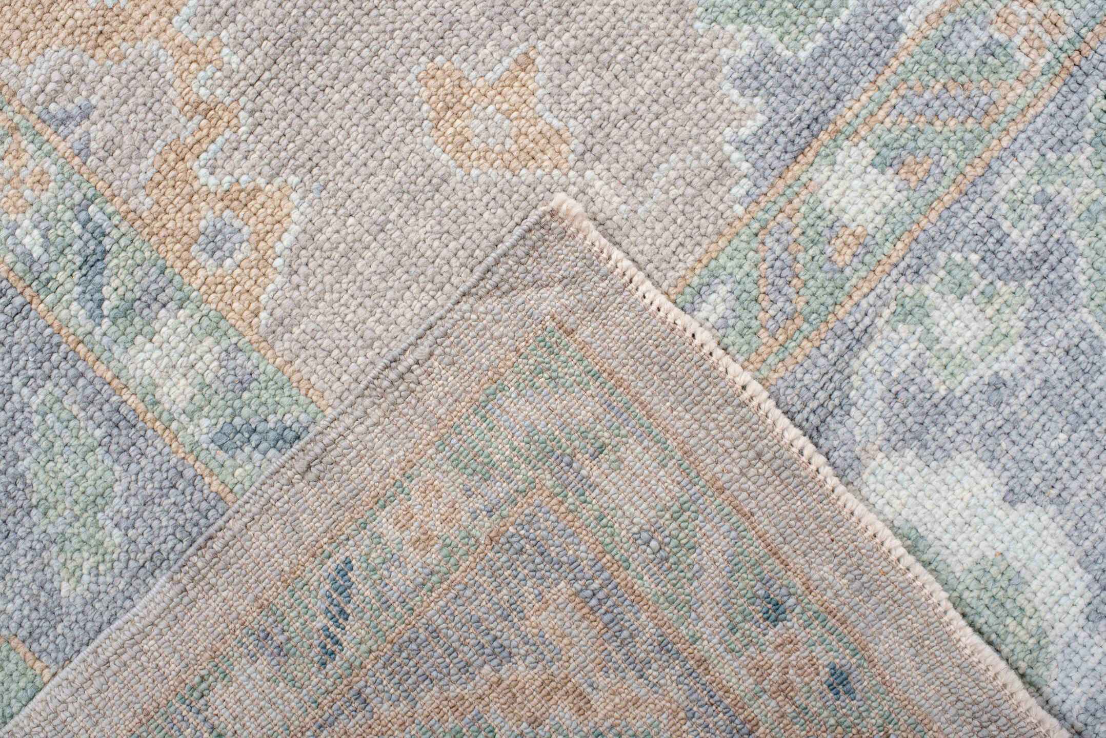 8' x 9' one-of-a-kind handmade vintage Oushak rug. Color palette: taupe, pale blue, ivory, sage, soft gold, peach, slate