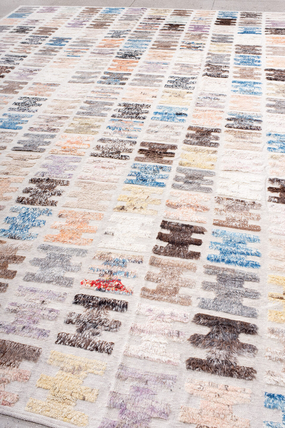 10' x 14' one-of-a-kind handmade vintage Tulu large size rug. Color palette: ivory, taupe, sky blue, charcoal, brown, peach