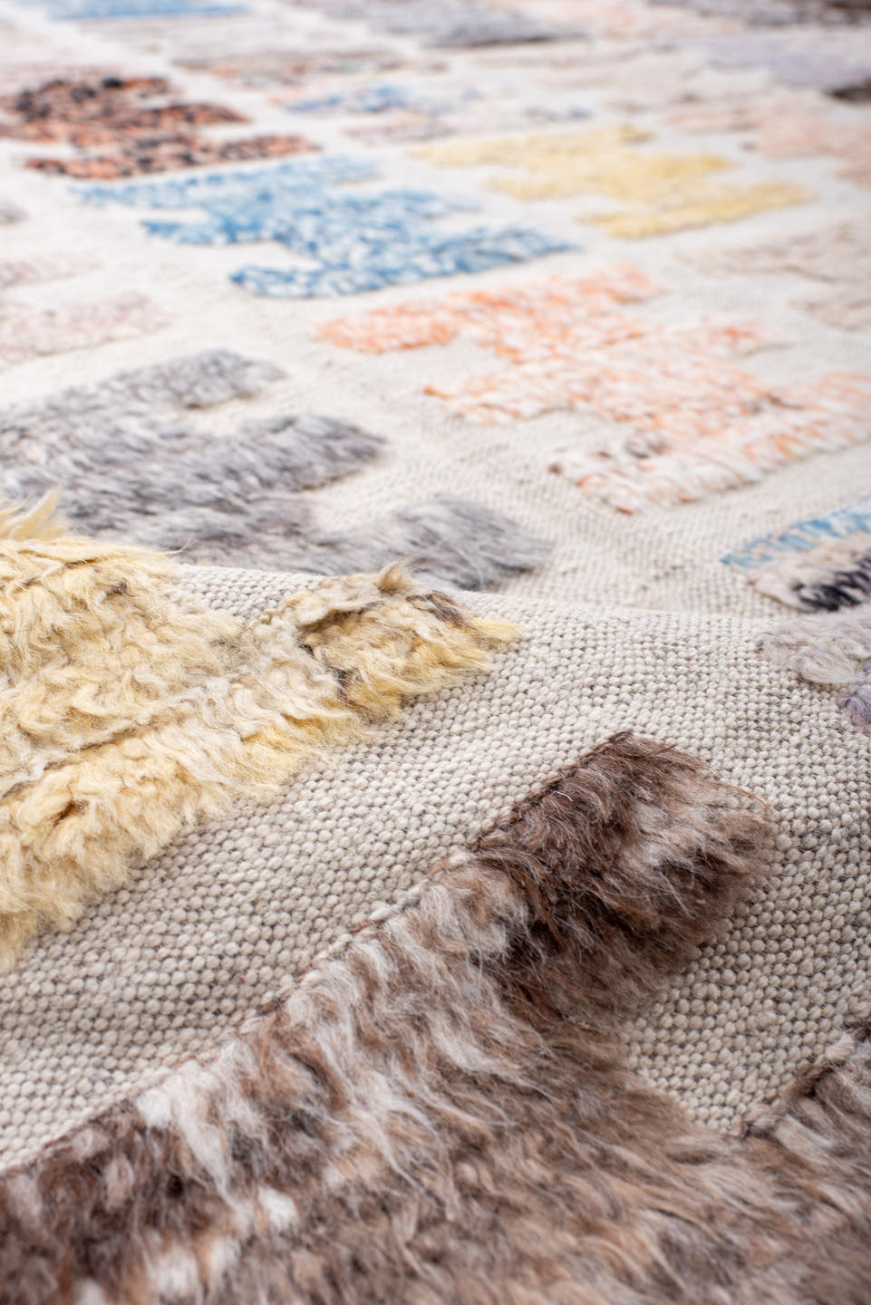 10' x 14' one-of-a-kind handmade vintage Tulu large size rug. Color palette: ivory, taupe, sky blue, charcoal, brown, peach
