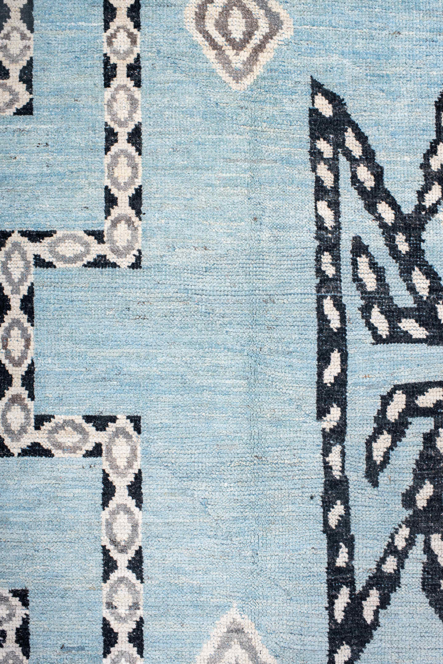 12' x 14' one-of-a-kind handmade vintage Tulu oversize rug. Color palette: sky blue, charcoal, ivory, slate, light blue