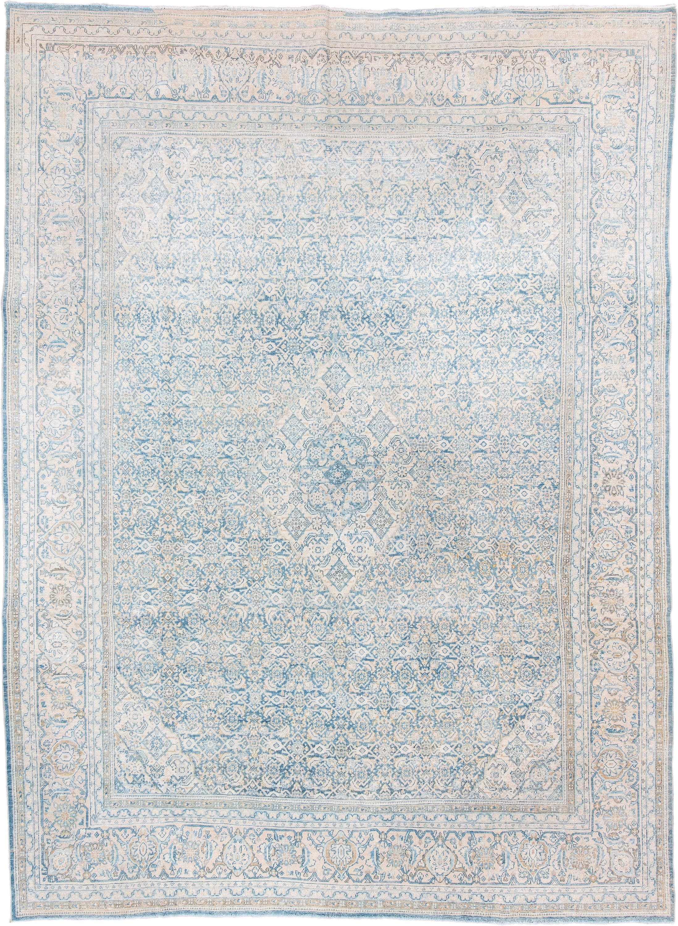 9' x 12' one-of-a-kind handmade antique Tabriz large size rug. Color palette: ivory, sky blue, pale blue, beige, cream