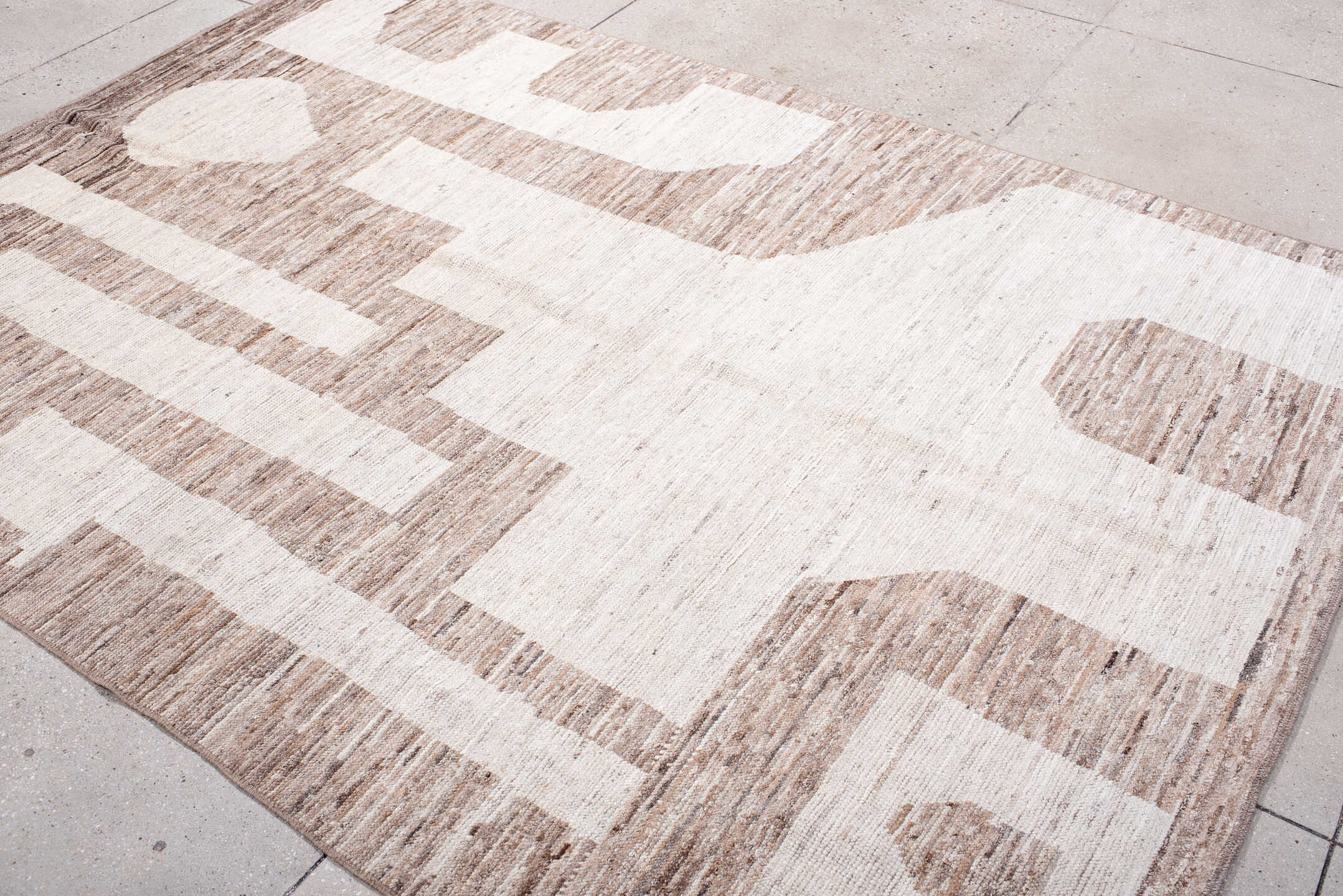 6' x 8' one-of-a-kind handmade vintage Tulu medium size rug. Color palette: ivory, taupe, beige, camel, gray