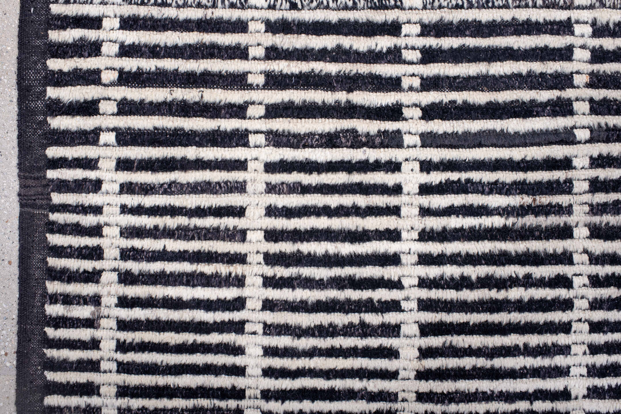 6' x 8' one-of-a-kind handmade vintage Tulu medium size rug. Color palette: black, ivory, charcoal, slate, gray