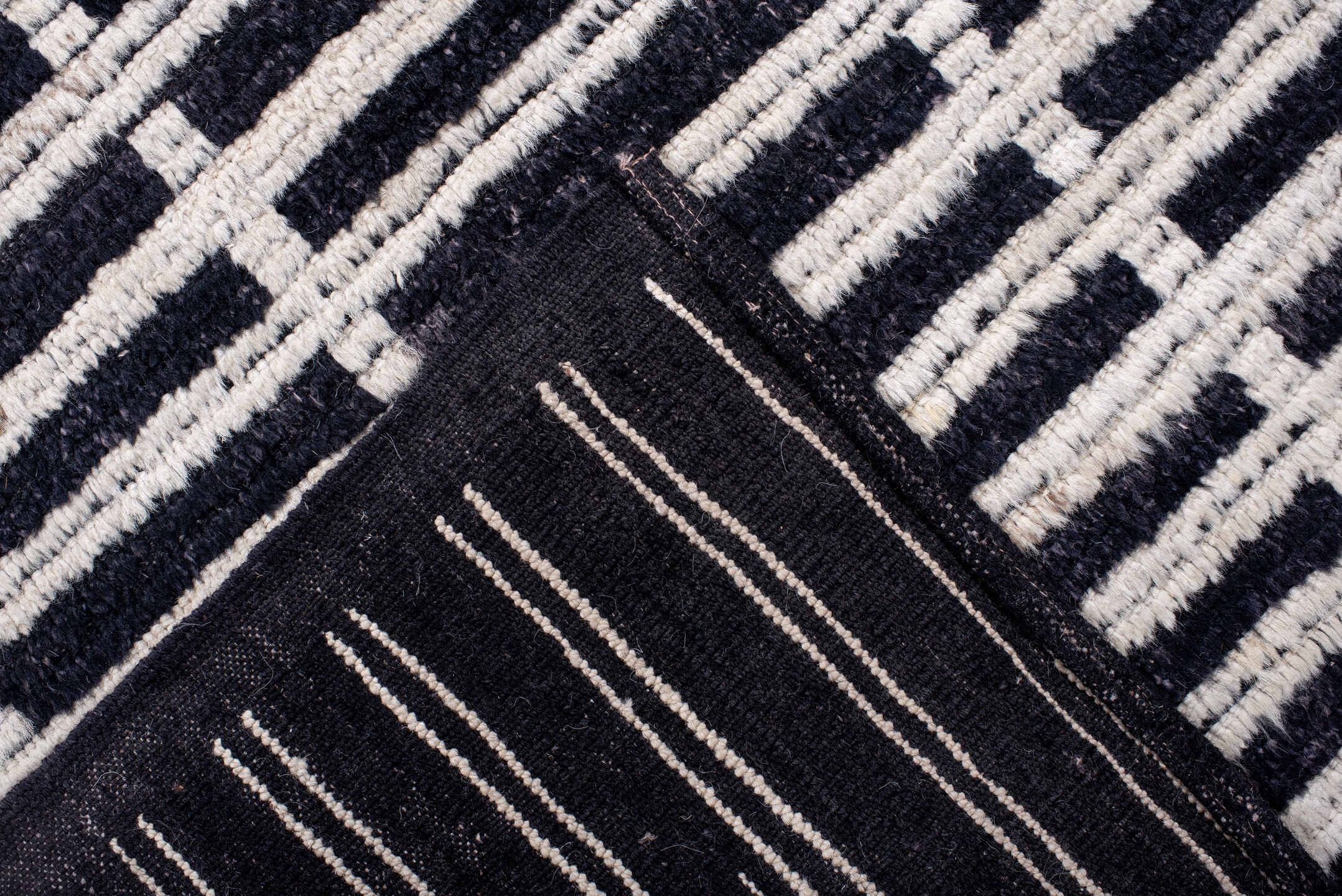 6' x 8' one-of-a-kind handmade vintage Tulu medium size rug. Color palette: black, ivory, charcoal, slate, gray