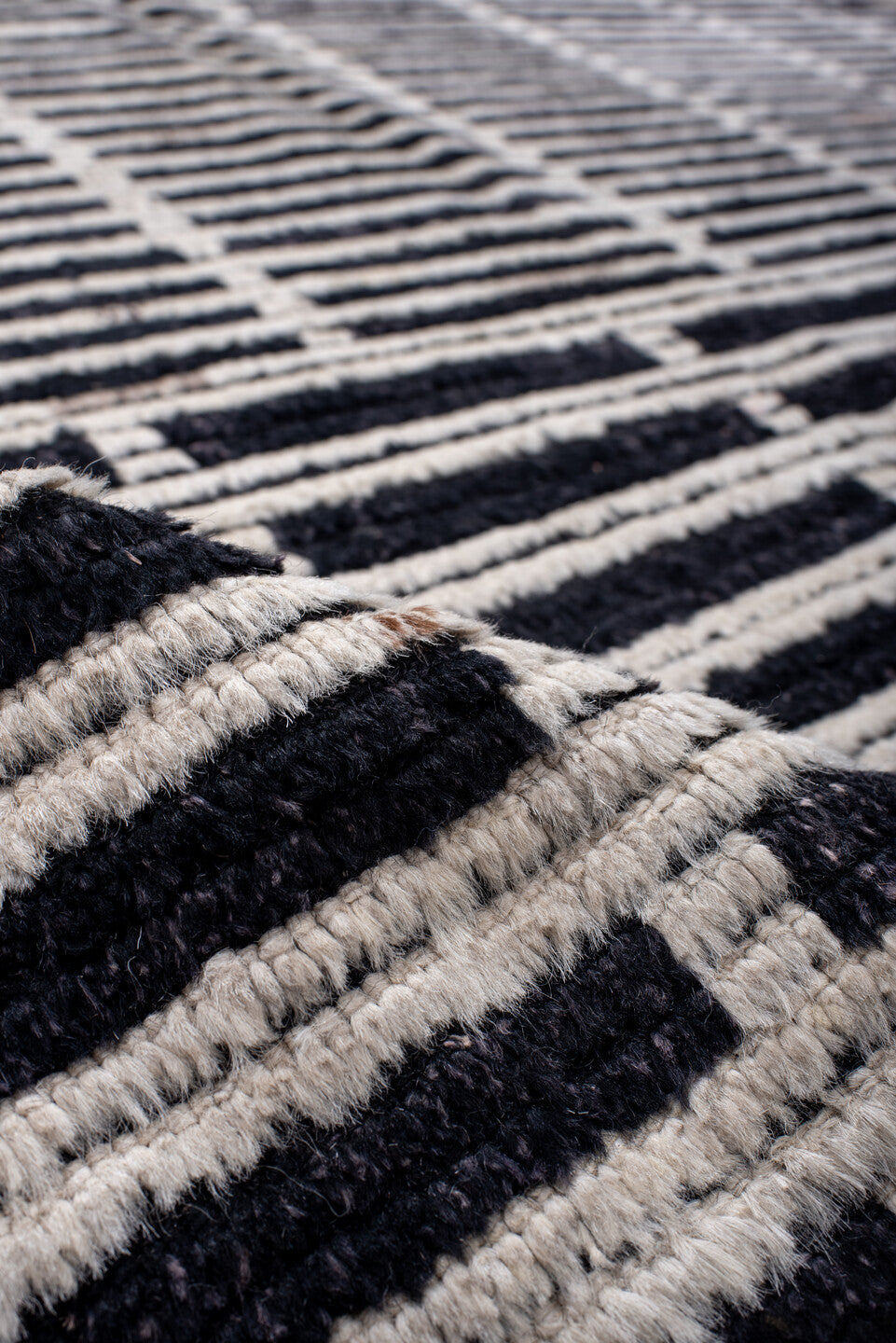 6' x 8' one-of-a-kind handmade vintage Tulu medium size rug. Color palette: black, ivory, charcoal, slate, gray
