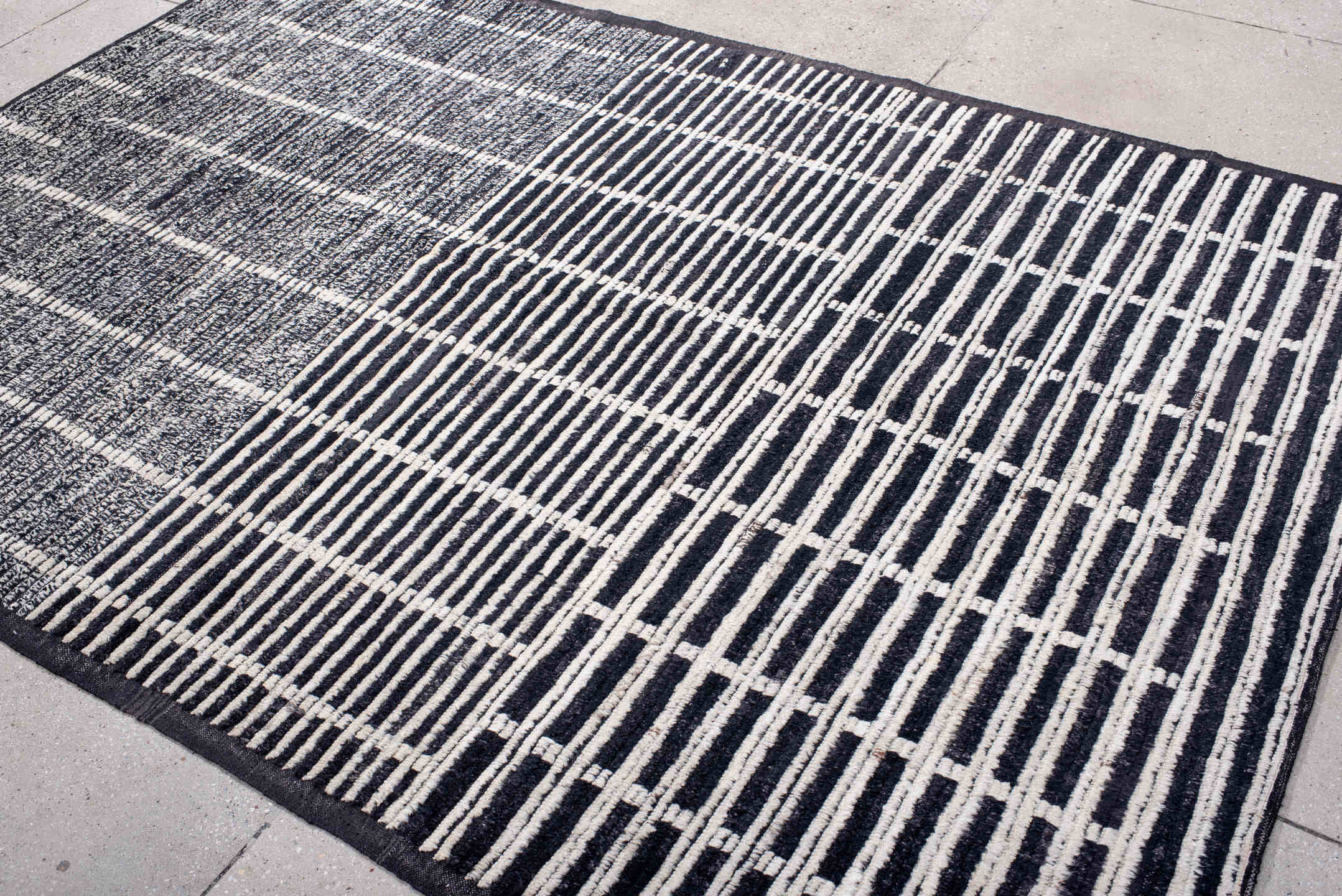 6' x 8' one-of-a-kind handmade vintage Tulu medium size rug. Color palette: black, ivory, charcoal, slate, gray