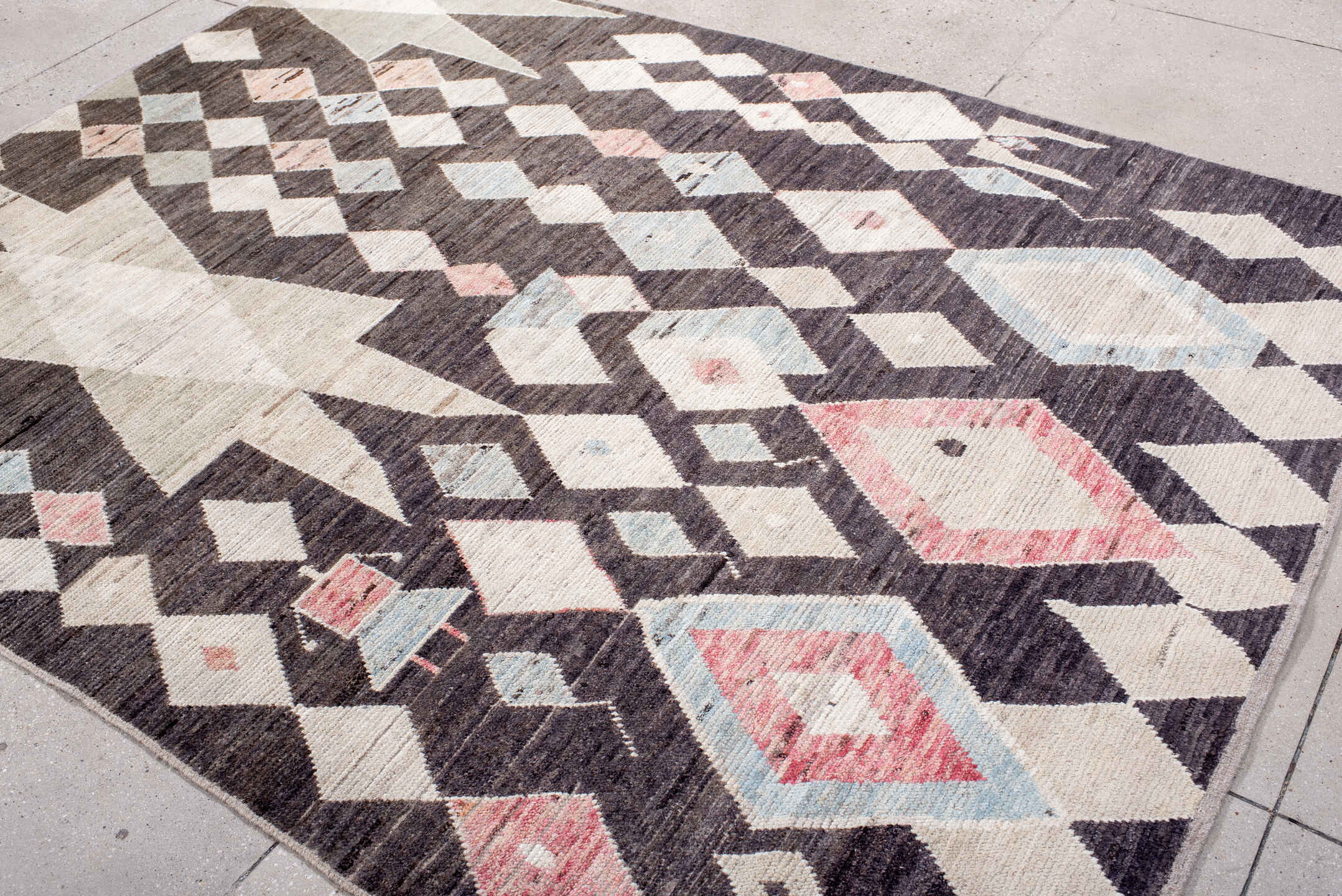 6' x 8' one-of-a-kind handmade vintage Tulu medium size rug. Color palette: brown, ivory, blush, pale_blue, taupe, pink