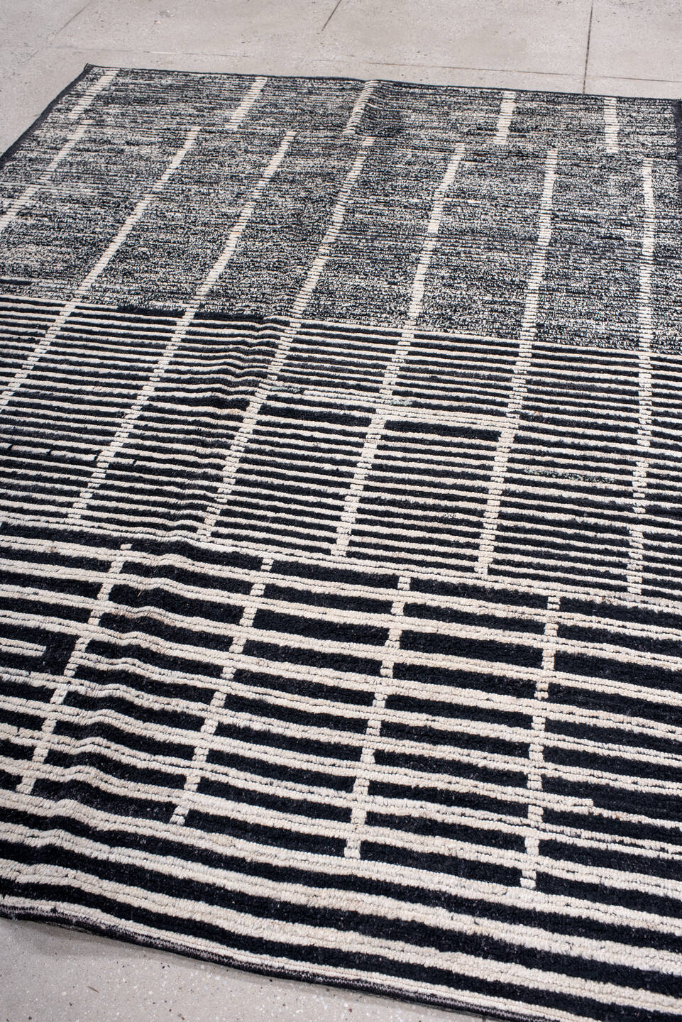 6' x 8' one-of-a-kind handmade vintage Tulu medium size rug. Color palette: ivory, charcoal, black, gray