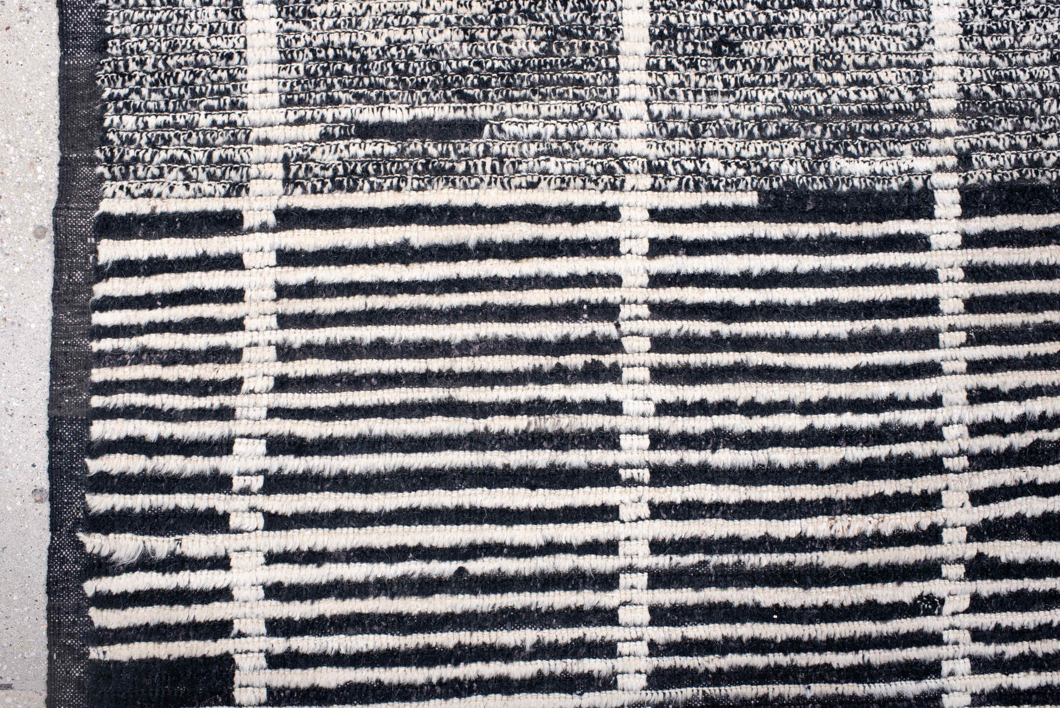6' x 8' one-of-a-kind handmade vintage Tulu medium size rug. Color palette: ivory, charcoal, black, gray