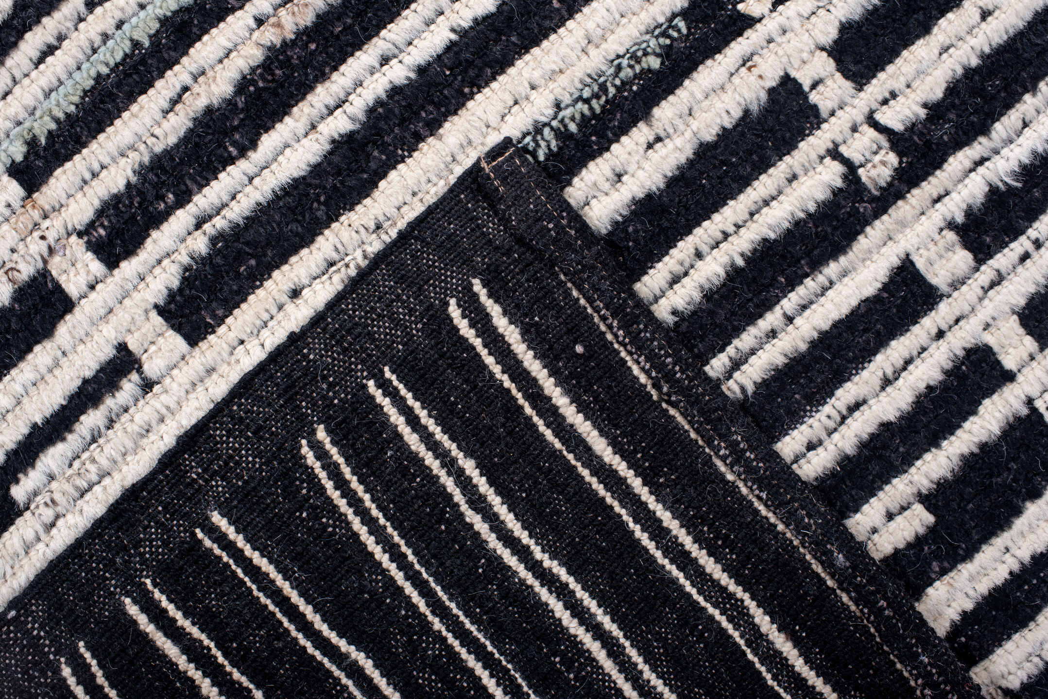 6' x 8' one-of-a-kind handmade vintage Tulu medium size rug. Color palette: ivory, charcoal, black, gray