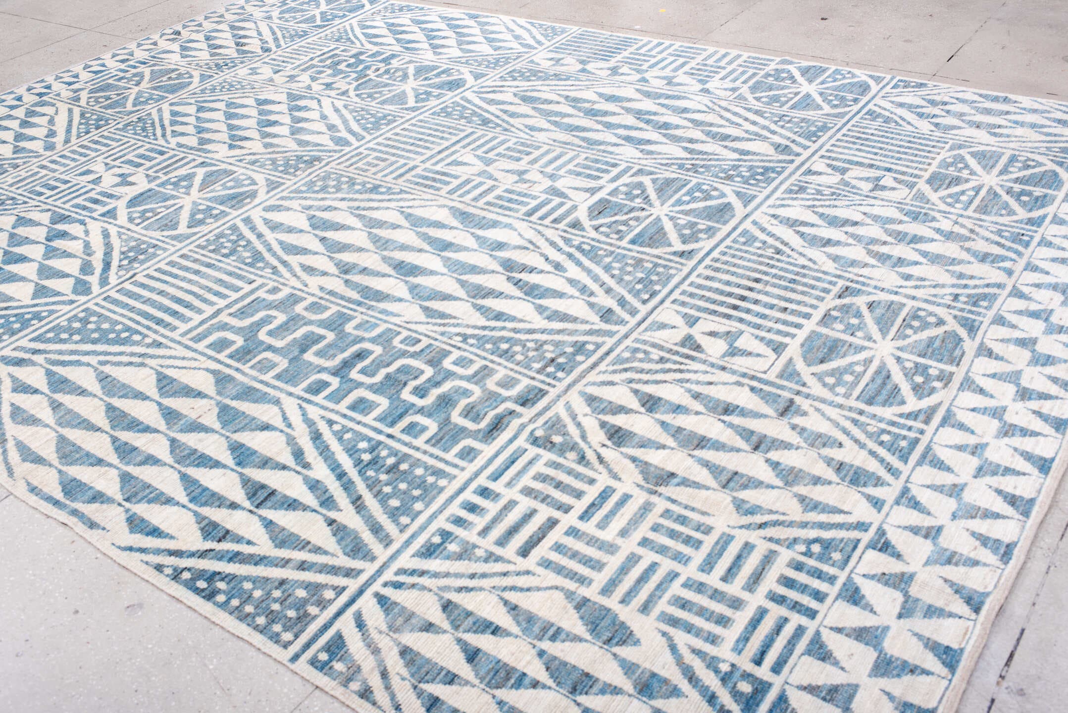 10' x 14' one-of-a-kind handmade vintage Tulu large size rug. Color palette: ivory, sky blue, powder blue, light blue