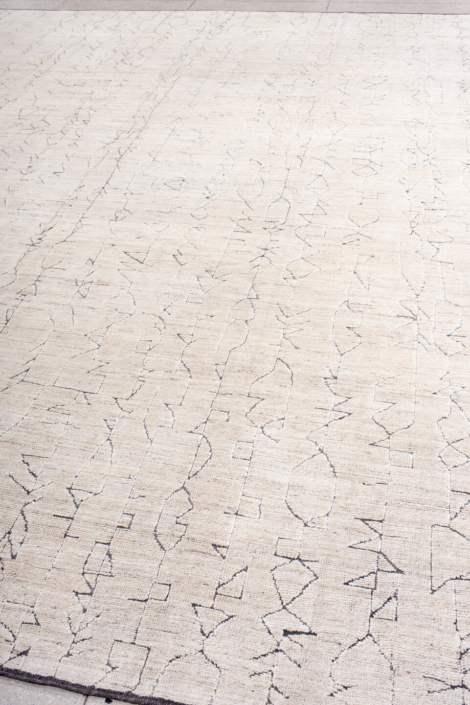 10' x 13' one-of-a-kind handmade vintage Tulu large size rug. Color palette: ivory, cream, charcoal, taupe, gray, black