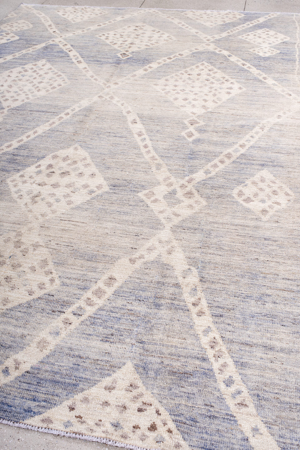 8' x 11' one-of-a-kind handmade vintage Tulu large size rug. Color palette: ivory, pale blue, taupe, cream, light blue