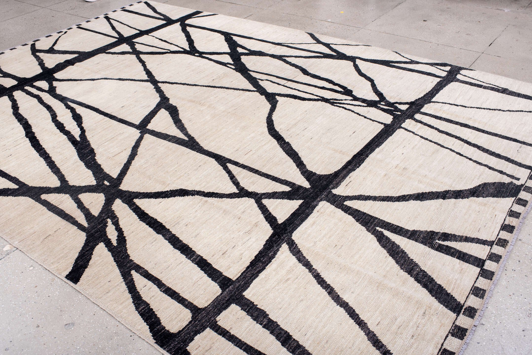 9' x 12' one-of-a-kind handmade vintage Tulu large size rug. Color palette: ivory, charcoal, black, gray