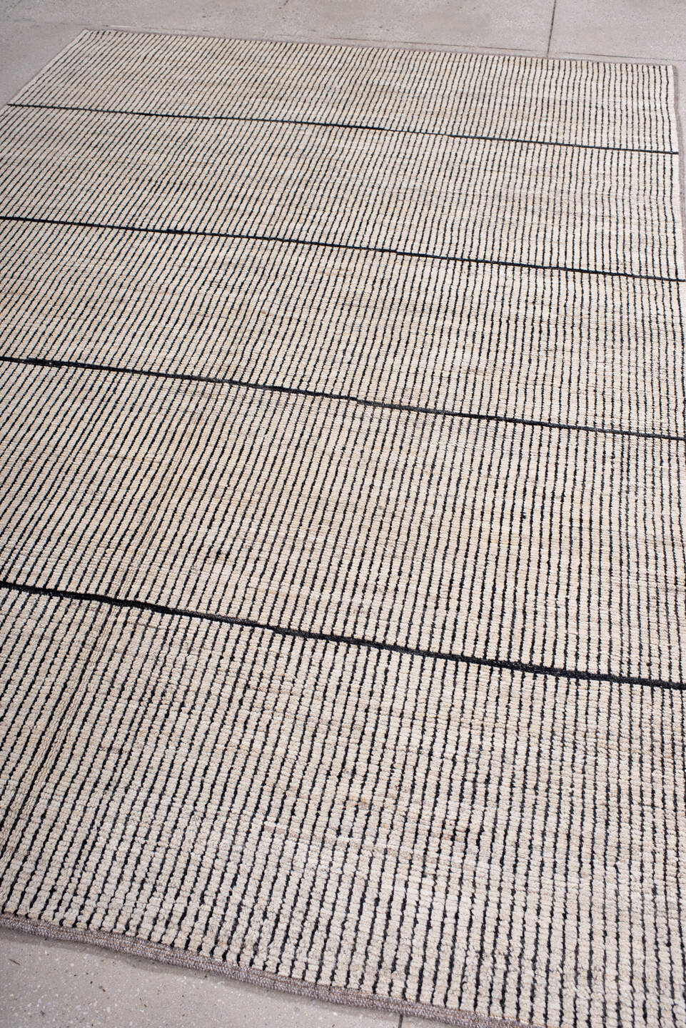 6' x 9' one-of-a-kind handmade vintage Tulu medium size rug. Color palette: ivory, charcoal, taupe, gray, black, beige