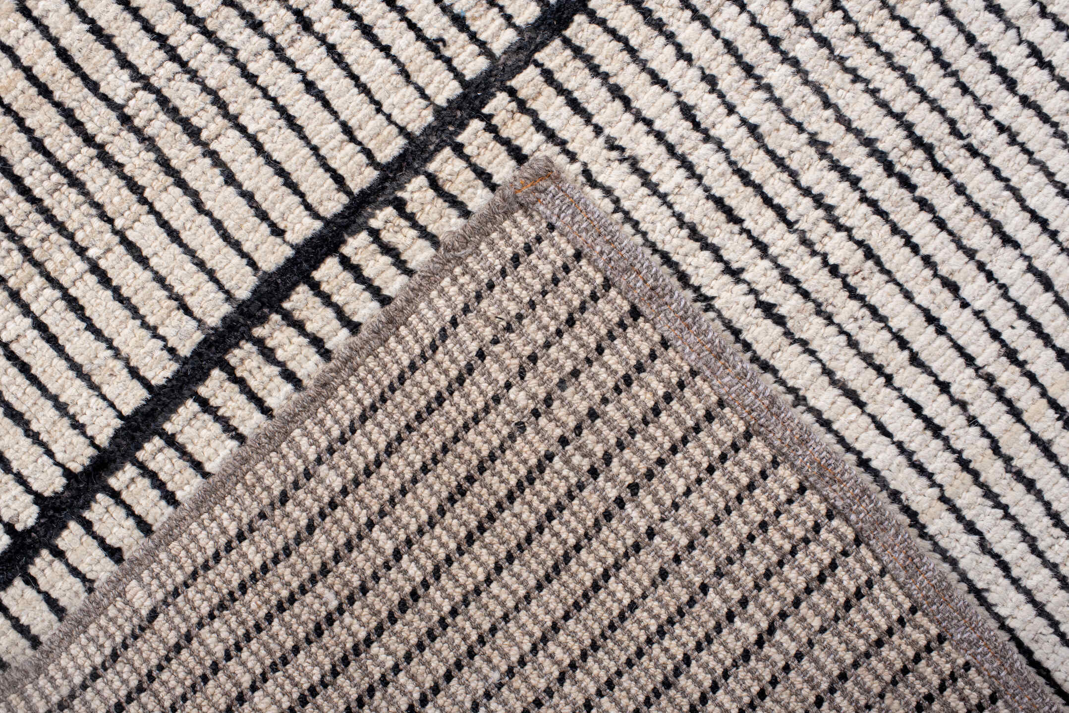 6' x 9' one-of-a-kind handmade vintage Tulu medium size rug. Color palette: ivory, charcoal, taupe, gray, black, beige