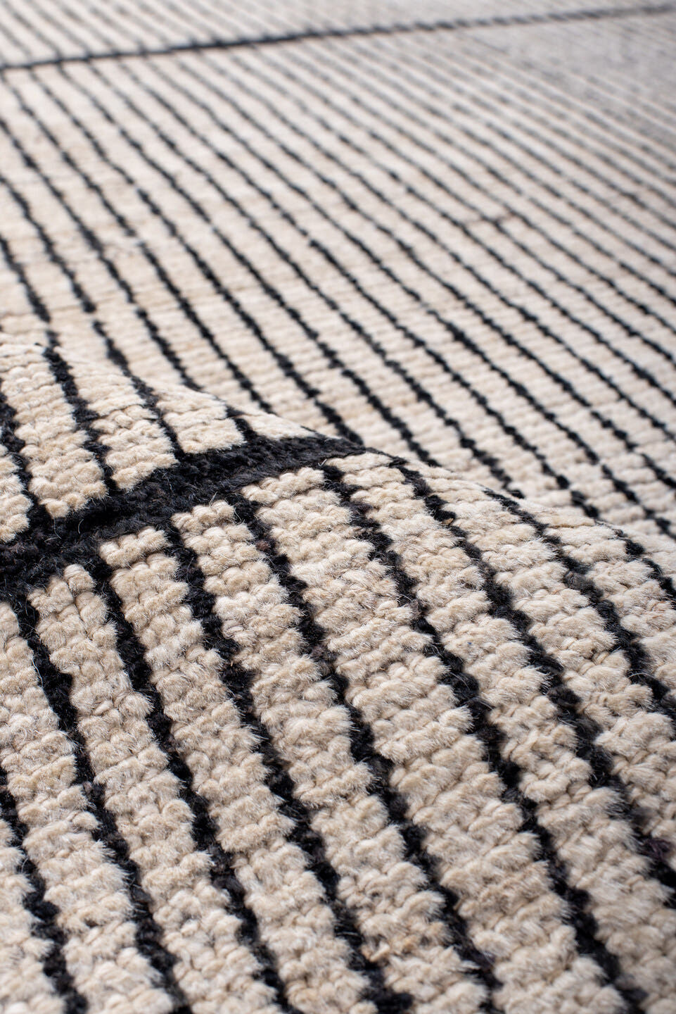 6' x 9' one-of-a-kind handmade vintage Tulu medium size rug. Color palette: ivory, charcoal, taupe, gray, black, beige