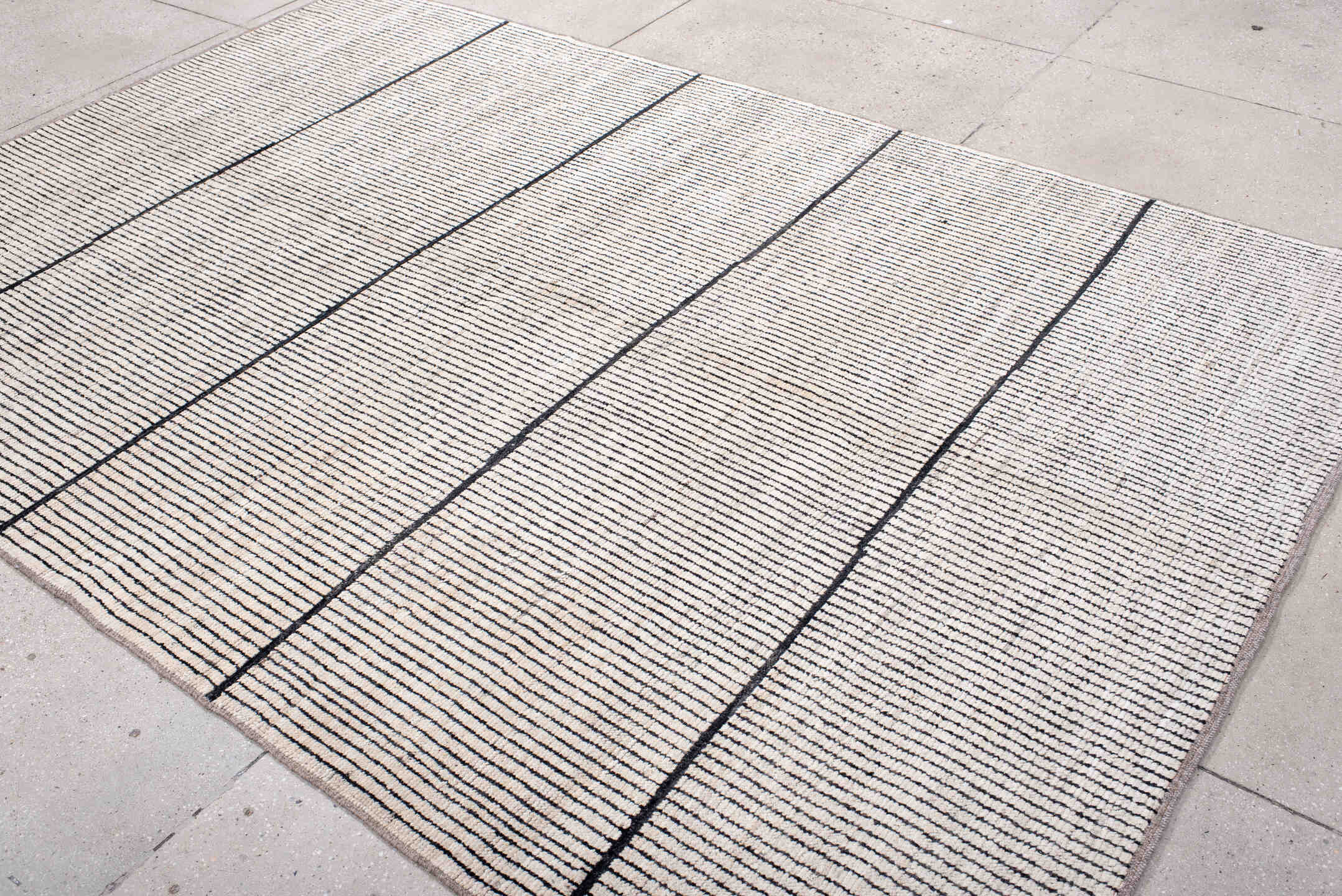 6' x 9' one-of-a-kind handmade vintage Tulu medium size rug. Color palette: ivory, charcoal, taupe, gray, black, beige