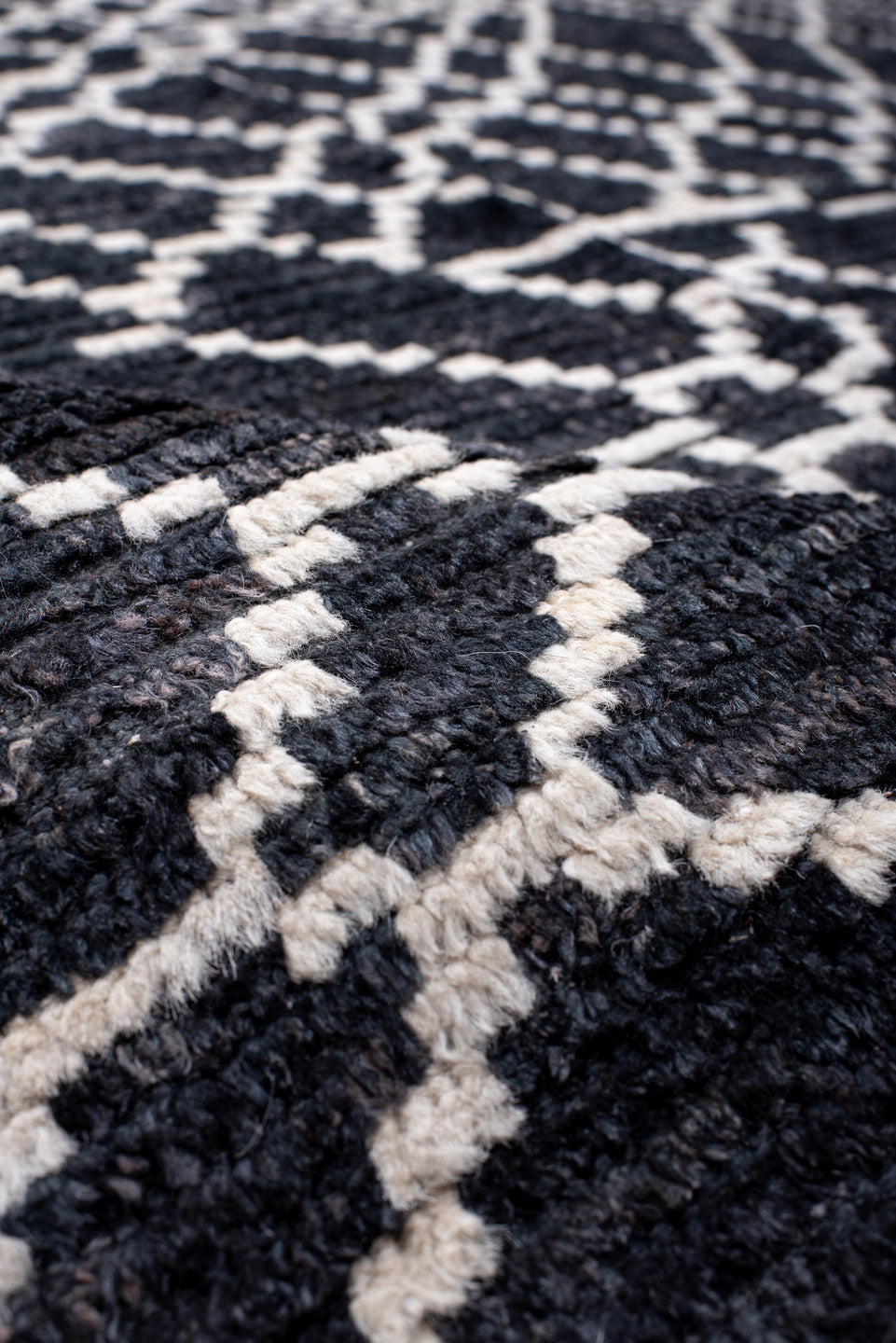 12' x 15' one-of-a-kind handmade vintage Tulu oversize rug. Color palette: charcoal, ivory, slate, gray, black