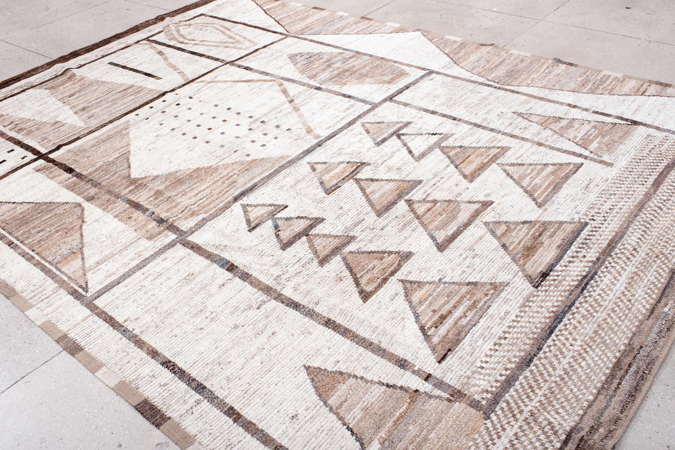 8' x 11' one-of-a-kind handmade vintage Tulu large size rug. Color palette: ivory, taupe, camel, brown, beige, gray
