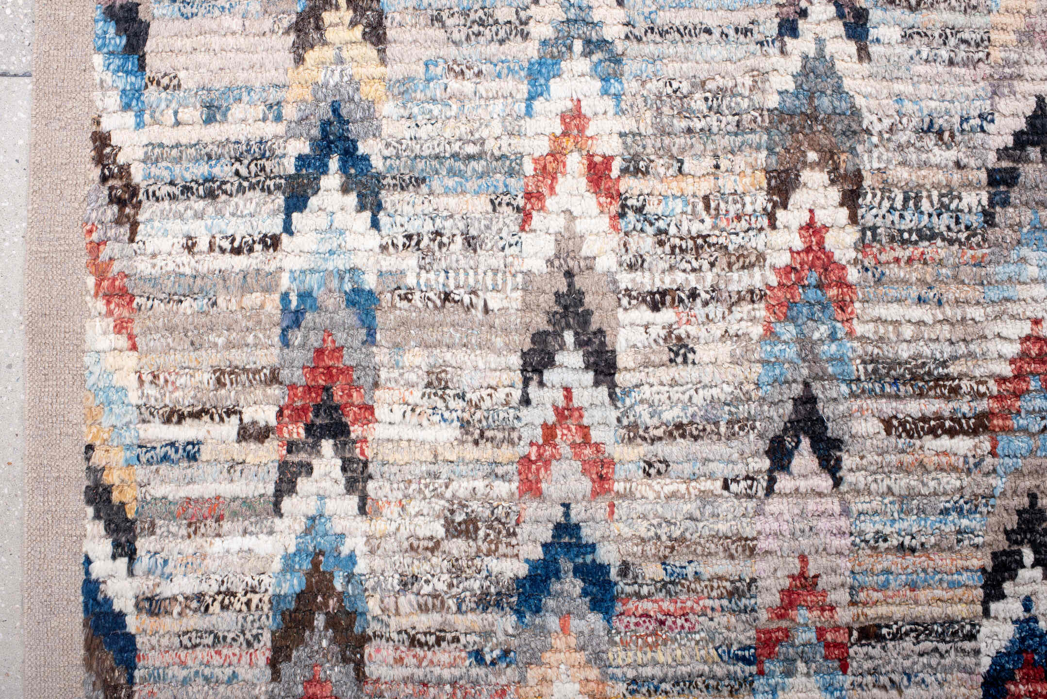 9' x 12' one-of-a-kind handmade vintage Tulu large size rug. Color palette: ivory, sky_blue, charcoal, taupe, rust, gold