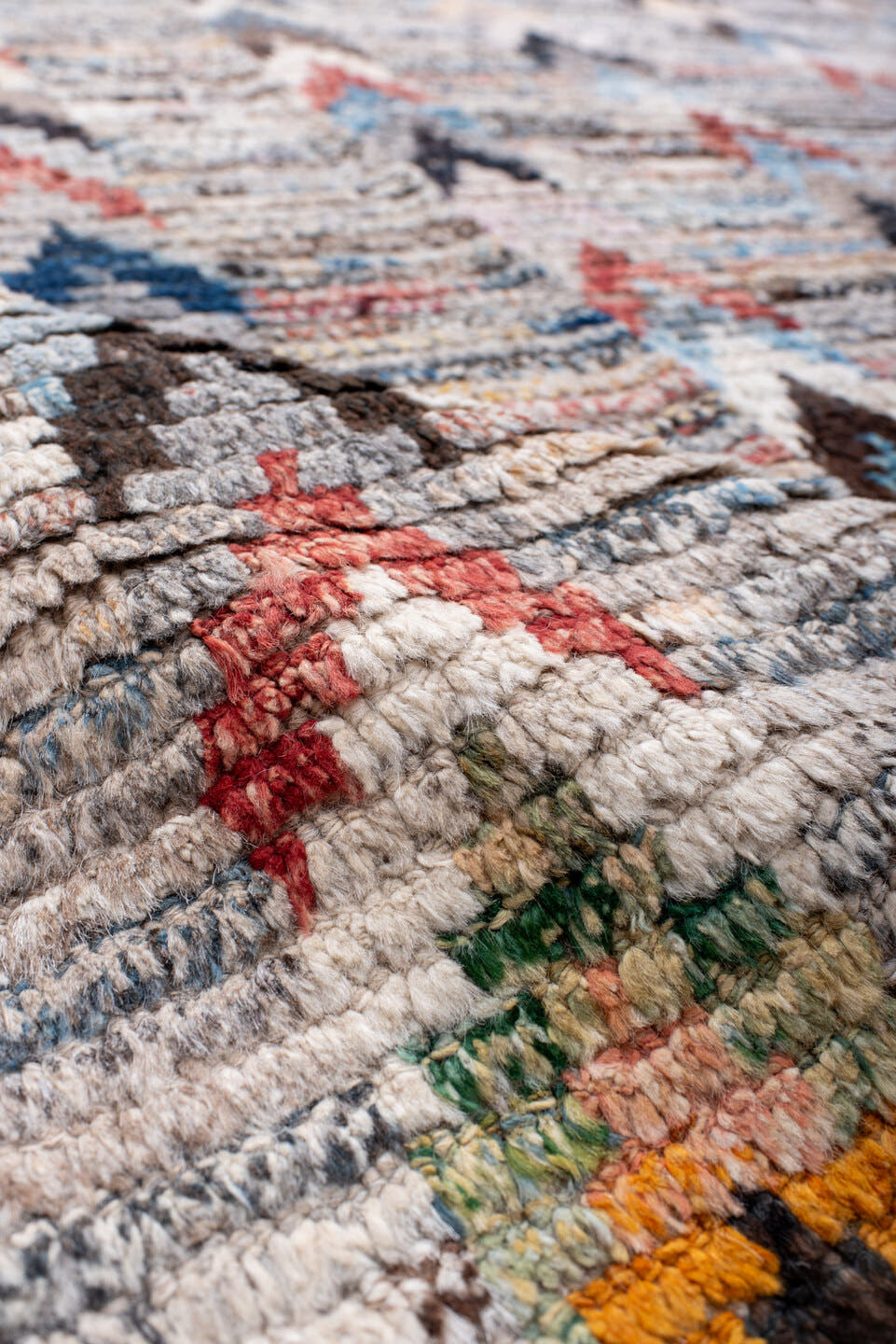 9' x 12' one-of-a-kind handmade vintage Tulu large size rug. Color palette: ivory, sky_blue, charcoal, taupe, rust, gold