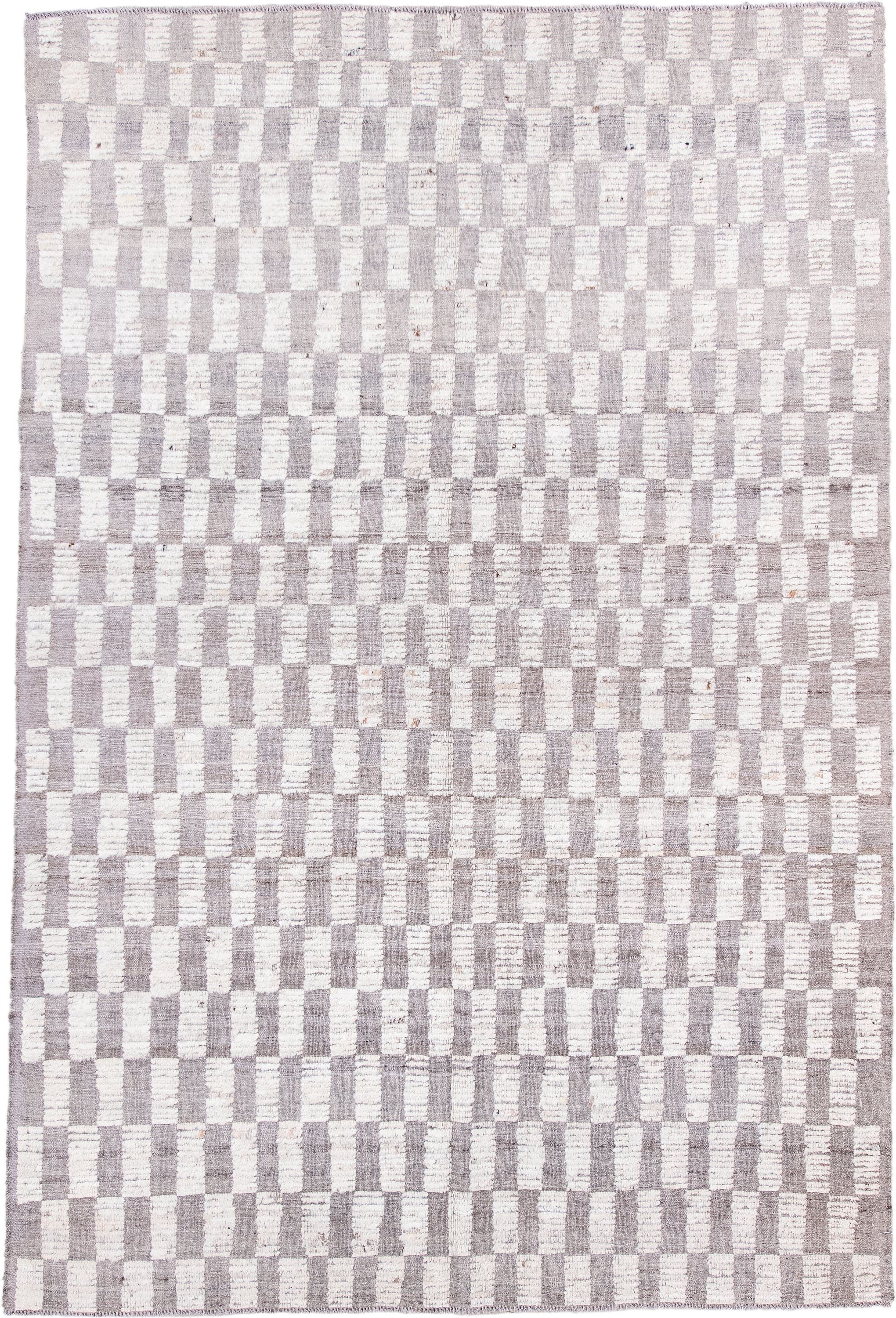 6' x 9' one-of-a-kind handmade vintage Tulu medium size rug. Color palette: ivory, taupe, light gray, beige, gray