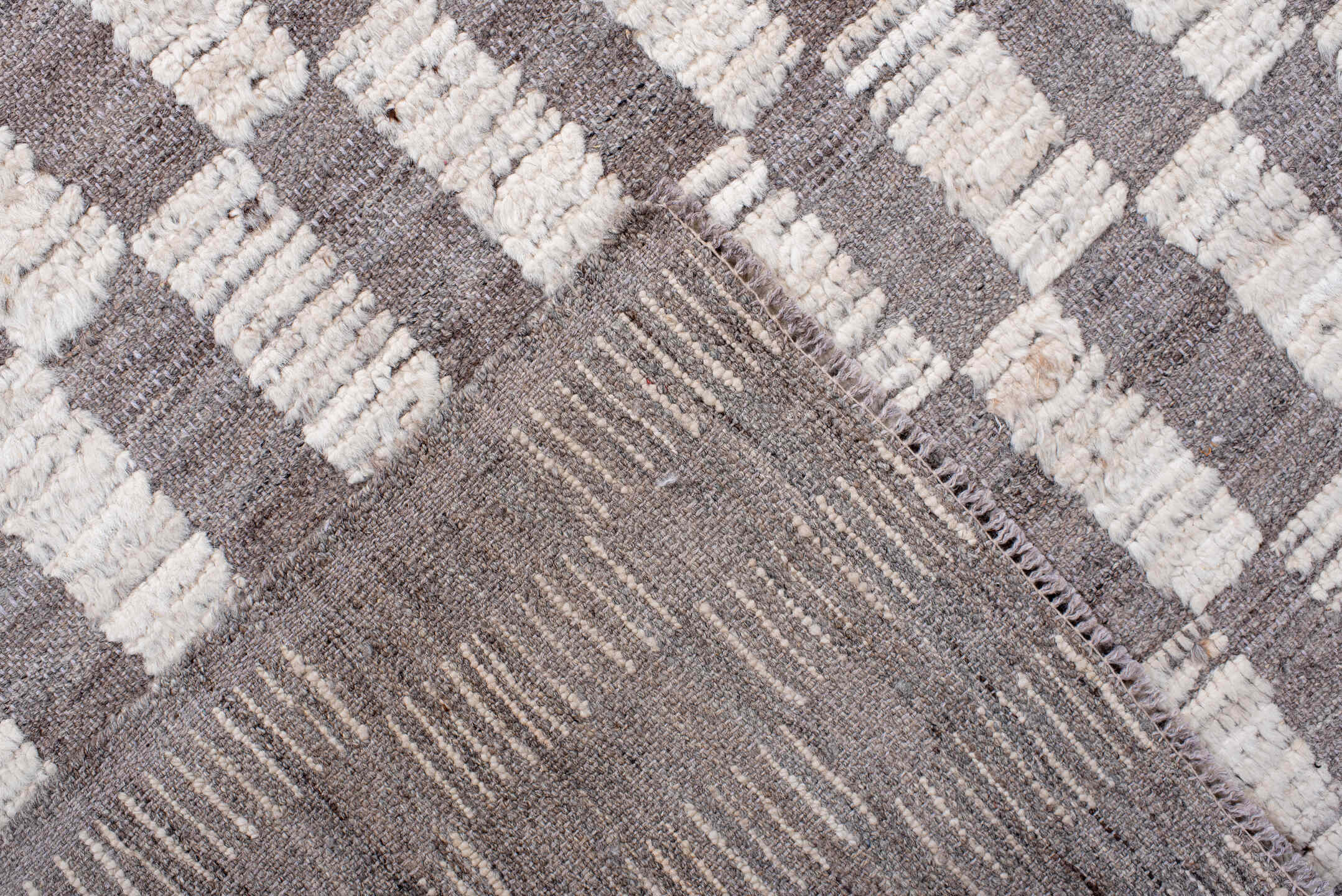 6' x 9' one-of-a-kind handmade vintage Tulu medium size rug. Color palette: ivory, taupe, light gray, beige, gray