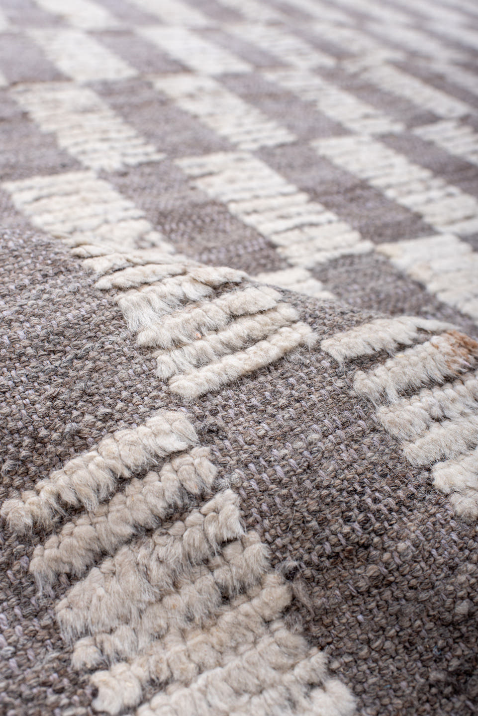 6' x 9' one-of-a-kind handmade vintage Tulu medium size rug. Color palette: ivory, taupe, light gray, beige, gray