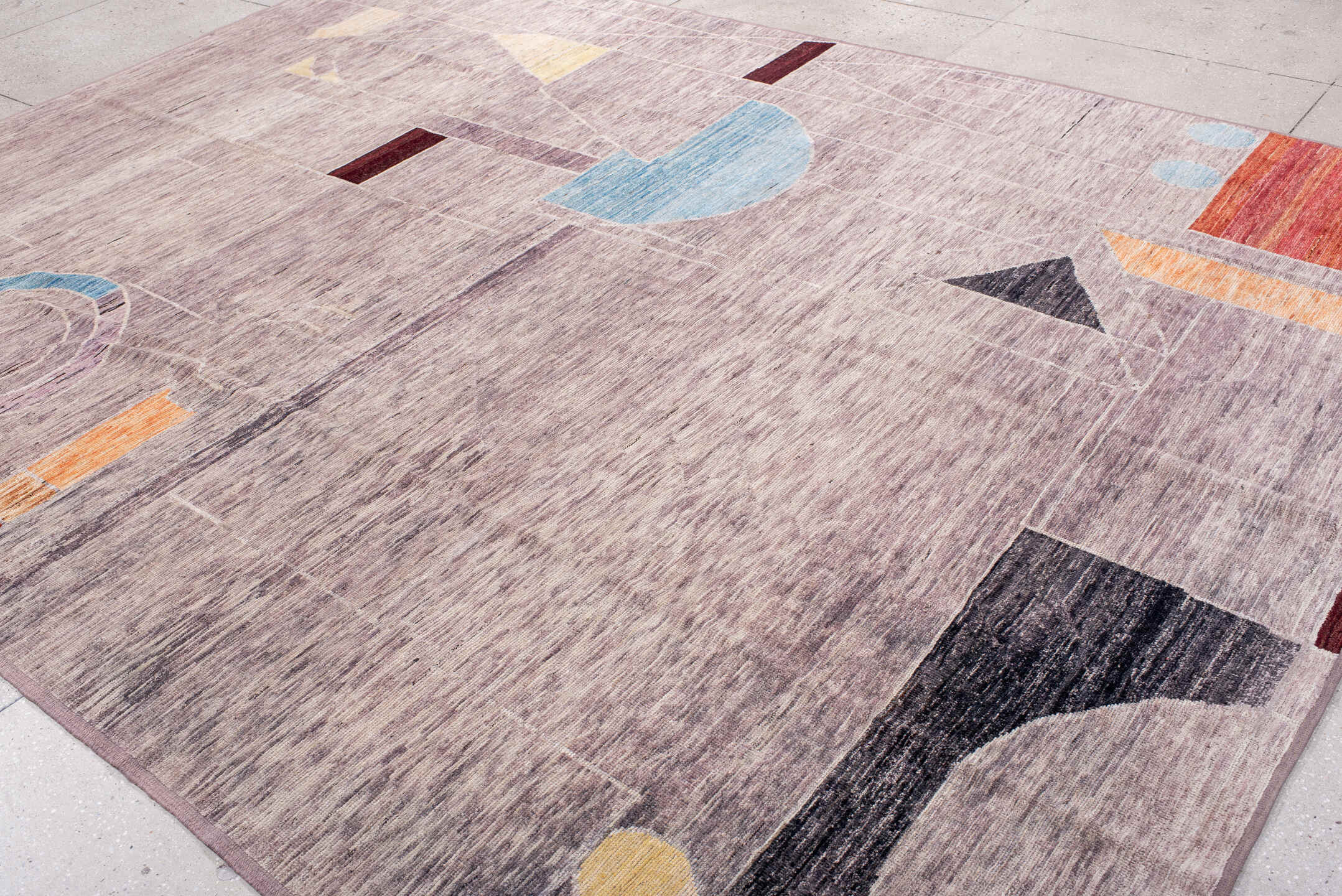 9' x 12' one-of-a-kind handmade vintage Tulu large size rug. Color palette: lavender, ivory, sky blue, rust, charcoal